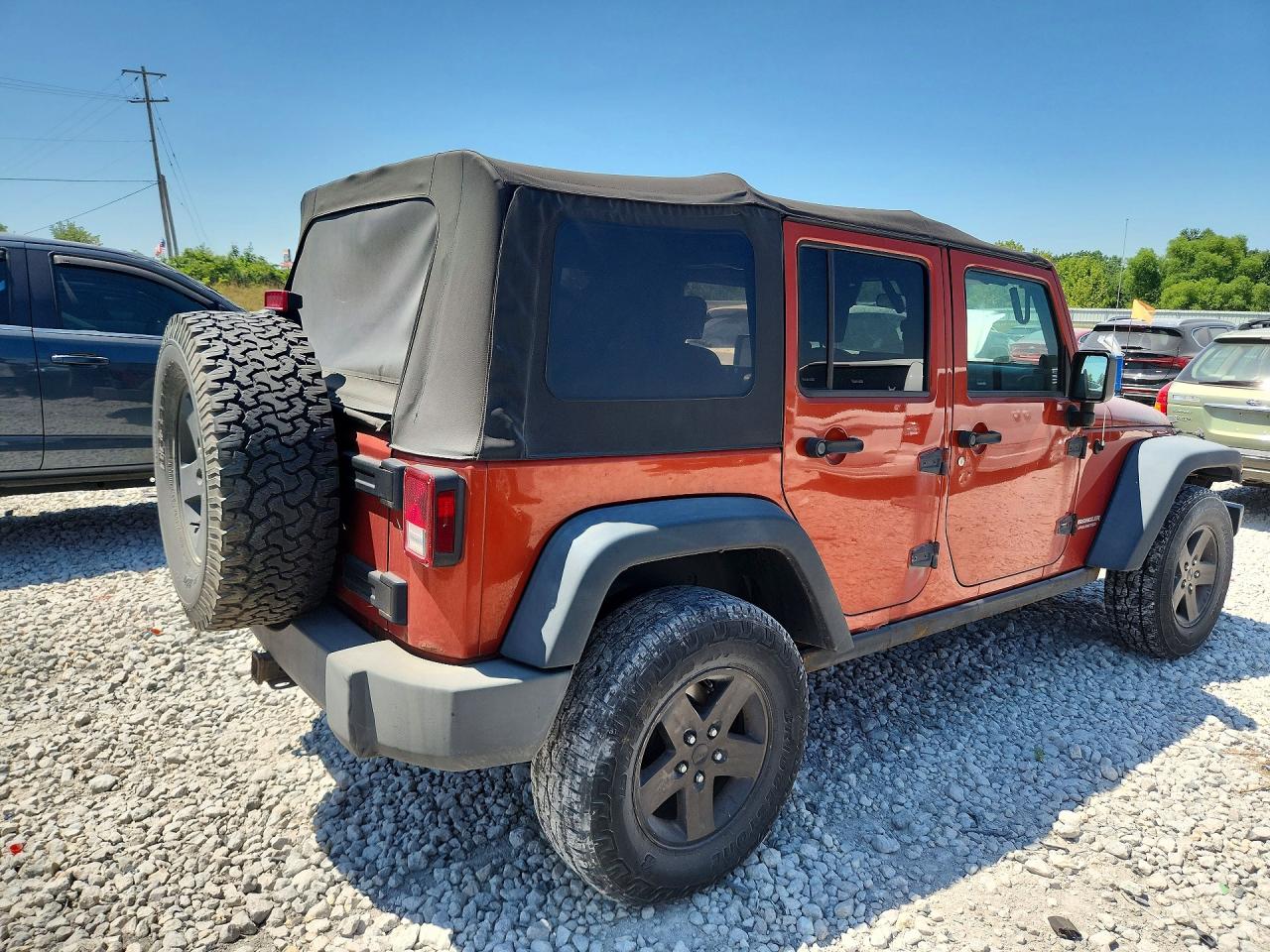 2009 Jeep Wrangler Unlimited Rubicon Orange vin: 1J4GA691X9L749677