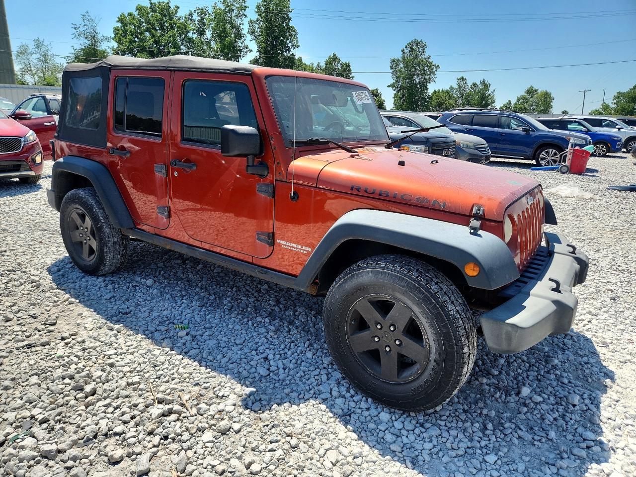 2009 Jeep Wrangler Unlimited Rubicon Orange vin: 1J4GA691X9L749677