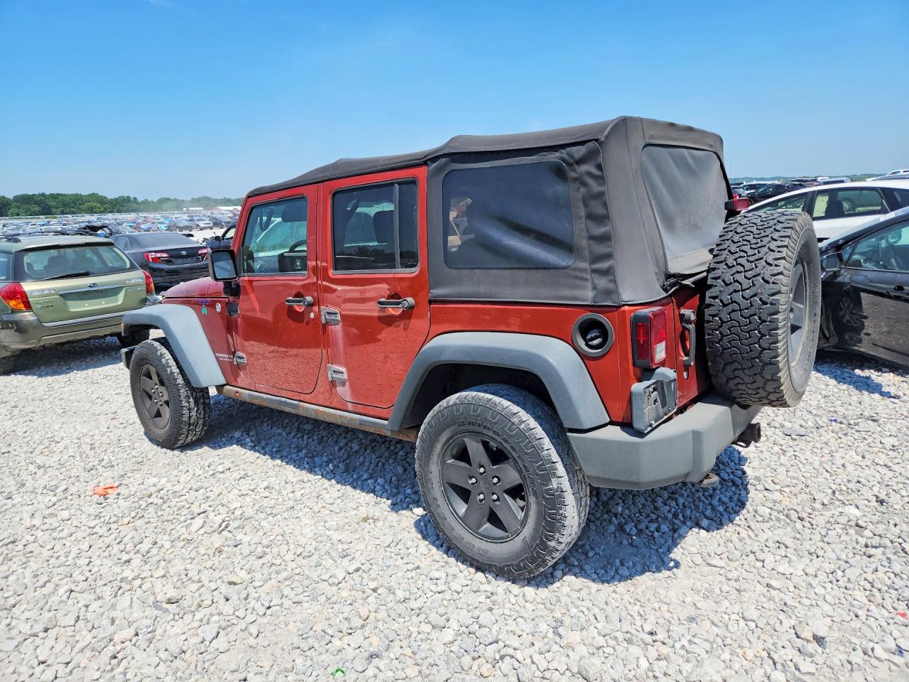 2009 Jeep Wrangler Unlimited Rubicon Orange vin: 1J4GA691X9L749677