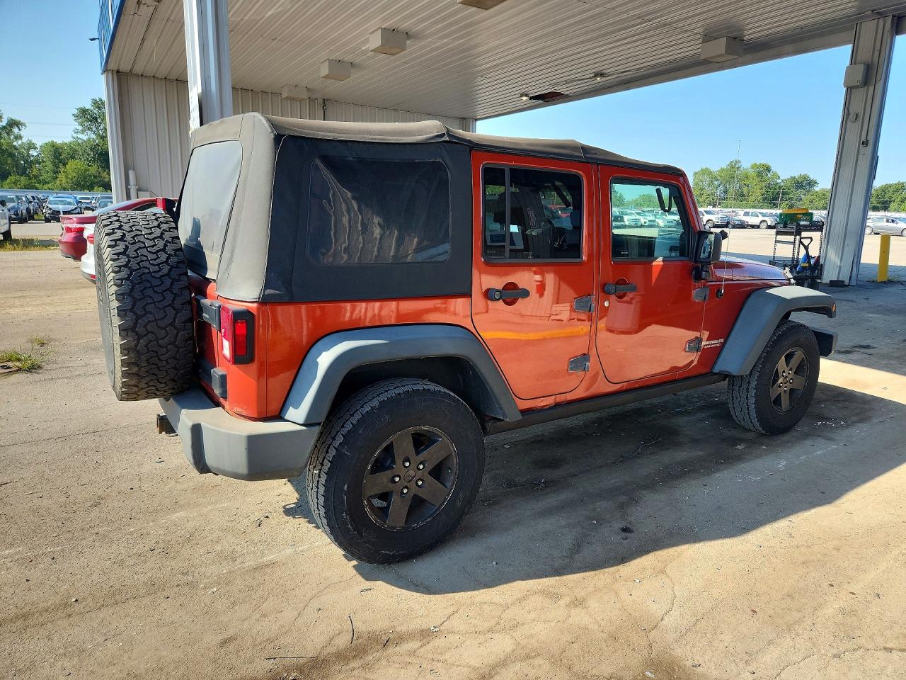 2009 Jeep Wrangler Unlimited Rubicon Orange vin: 1J4GA691X9L749677