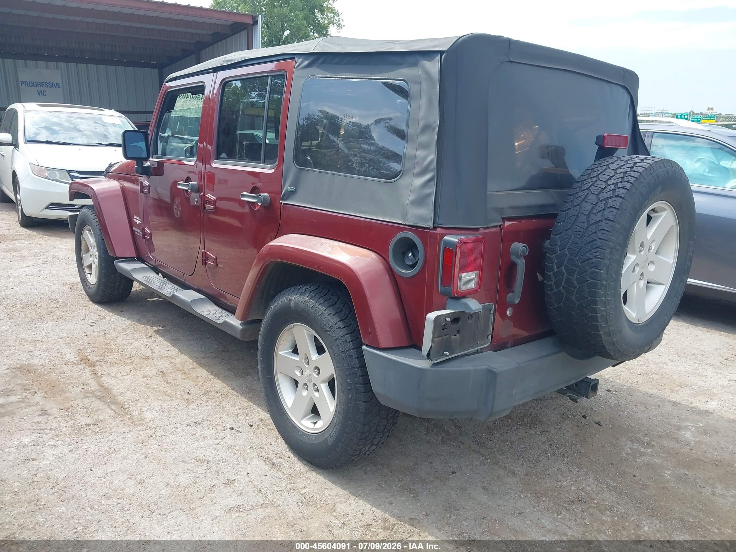 2007 Jeep Wrangler Unlimited Sahara Red vin: 1J4GB59197L181085