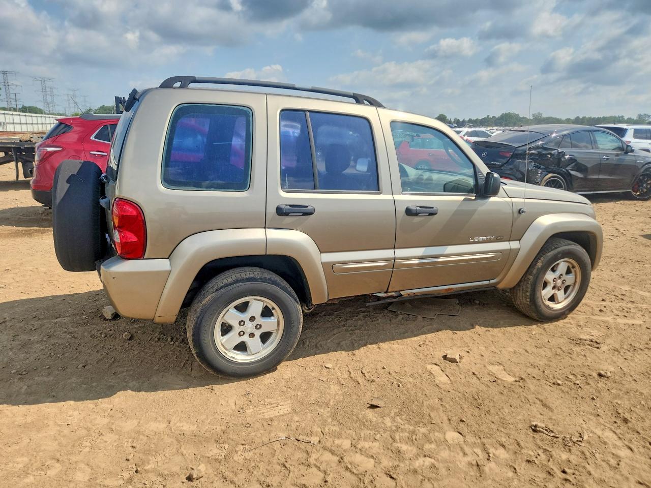 2003 Jeep Liberty Limited Tan vin: 1J4GK58K53W666813