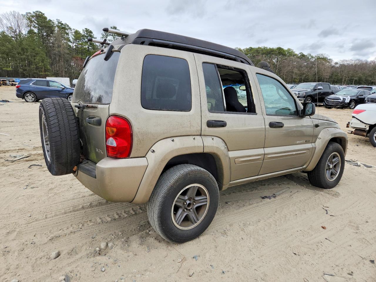 2003 Jeep Liberty Tan vin: 1J4GL38K33W660736