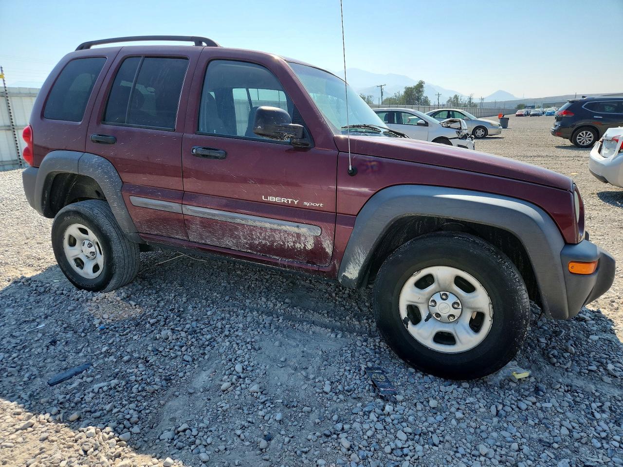 2002 Jeep Liberty Sport Burgundy vin: 1J4GL48K12W296207