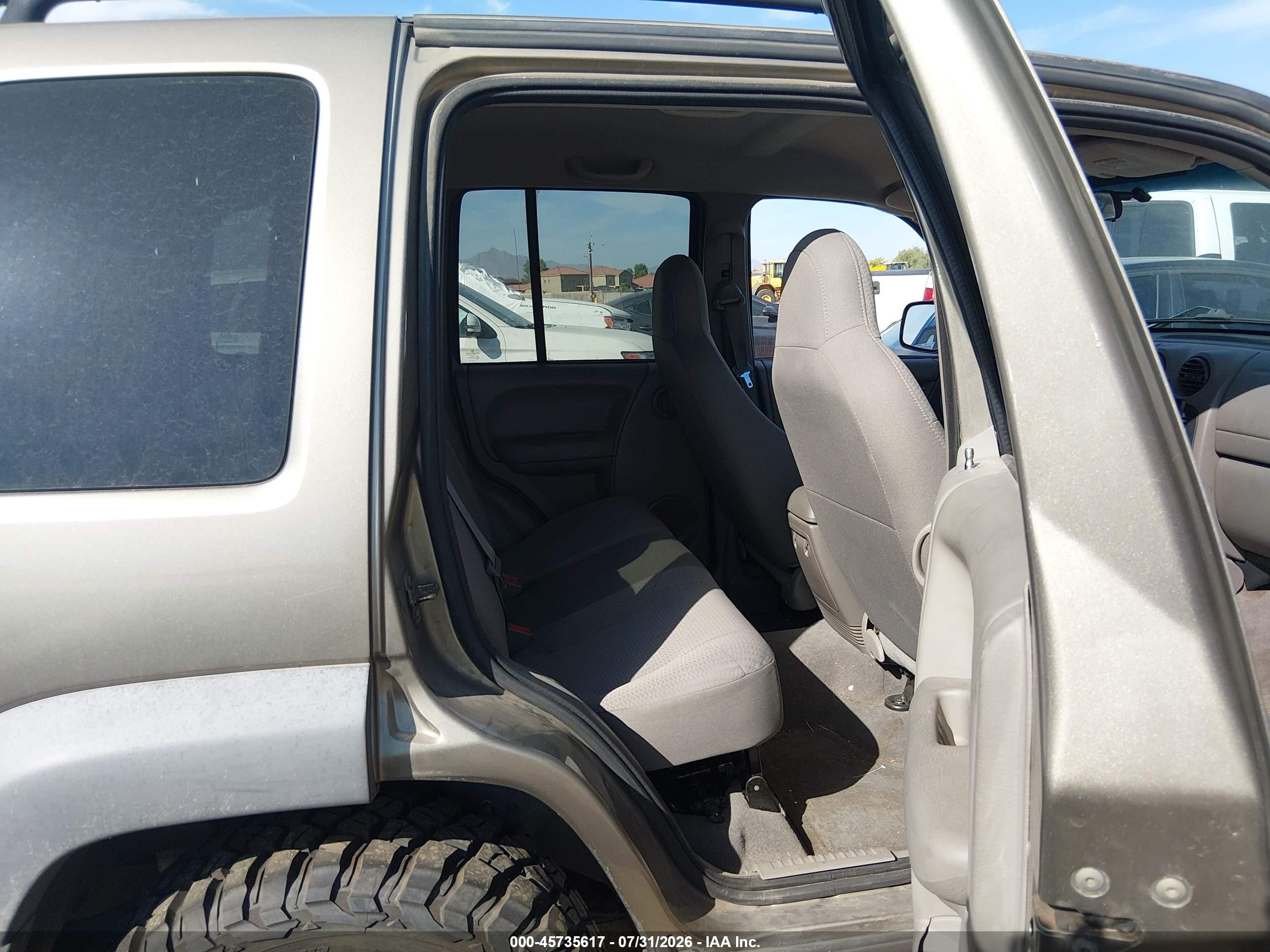 2003 Jeep Liberty Sport Gold vin: 1J4GL48K43W574437