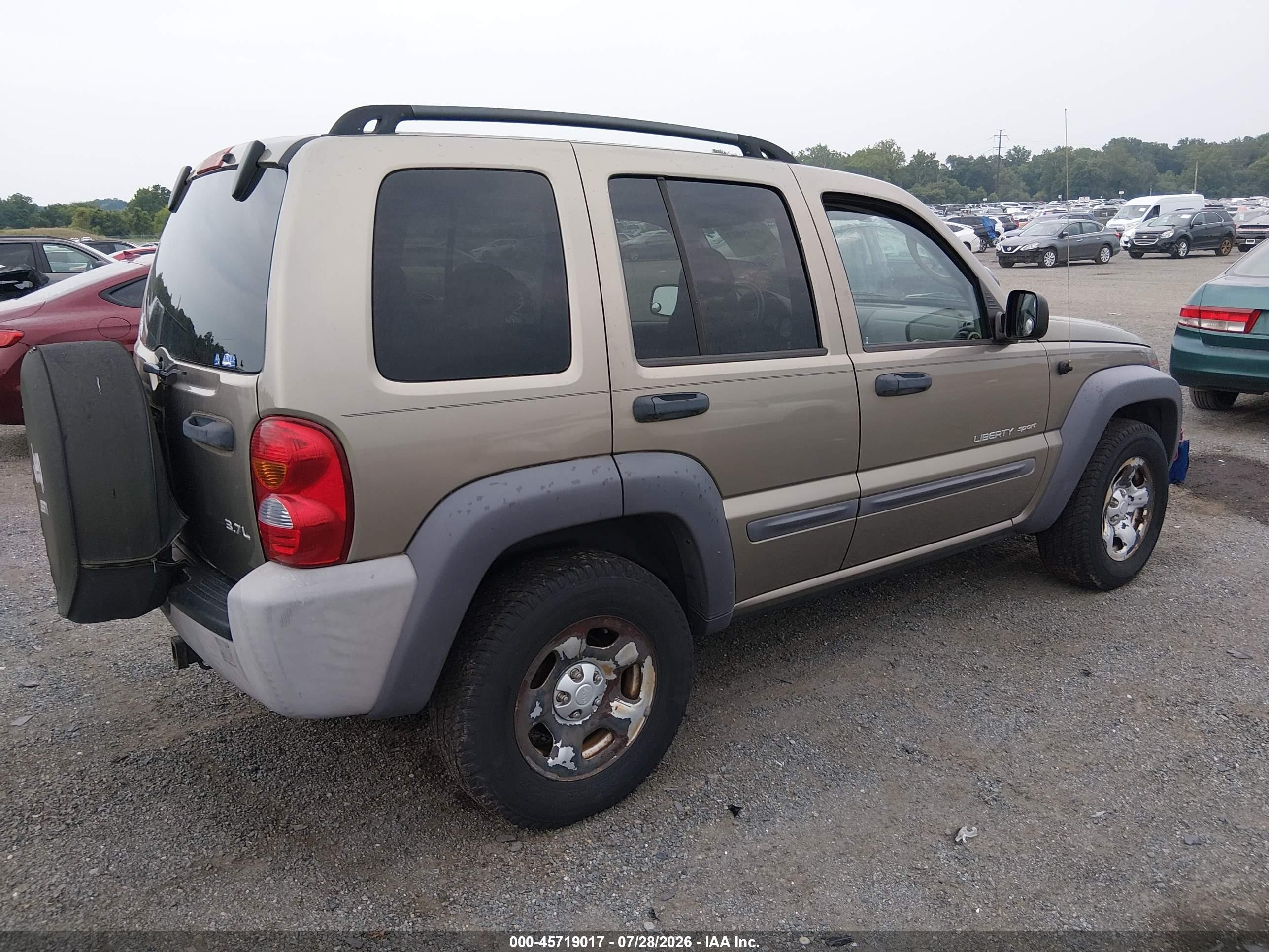 2003 Jeep Liberty Sport Золотой vin: 1J4GL48K83W648703