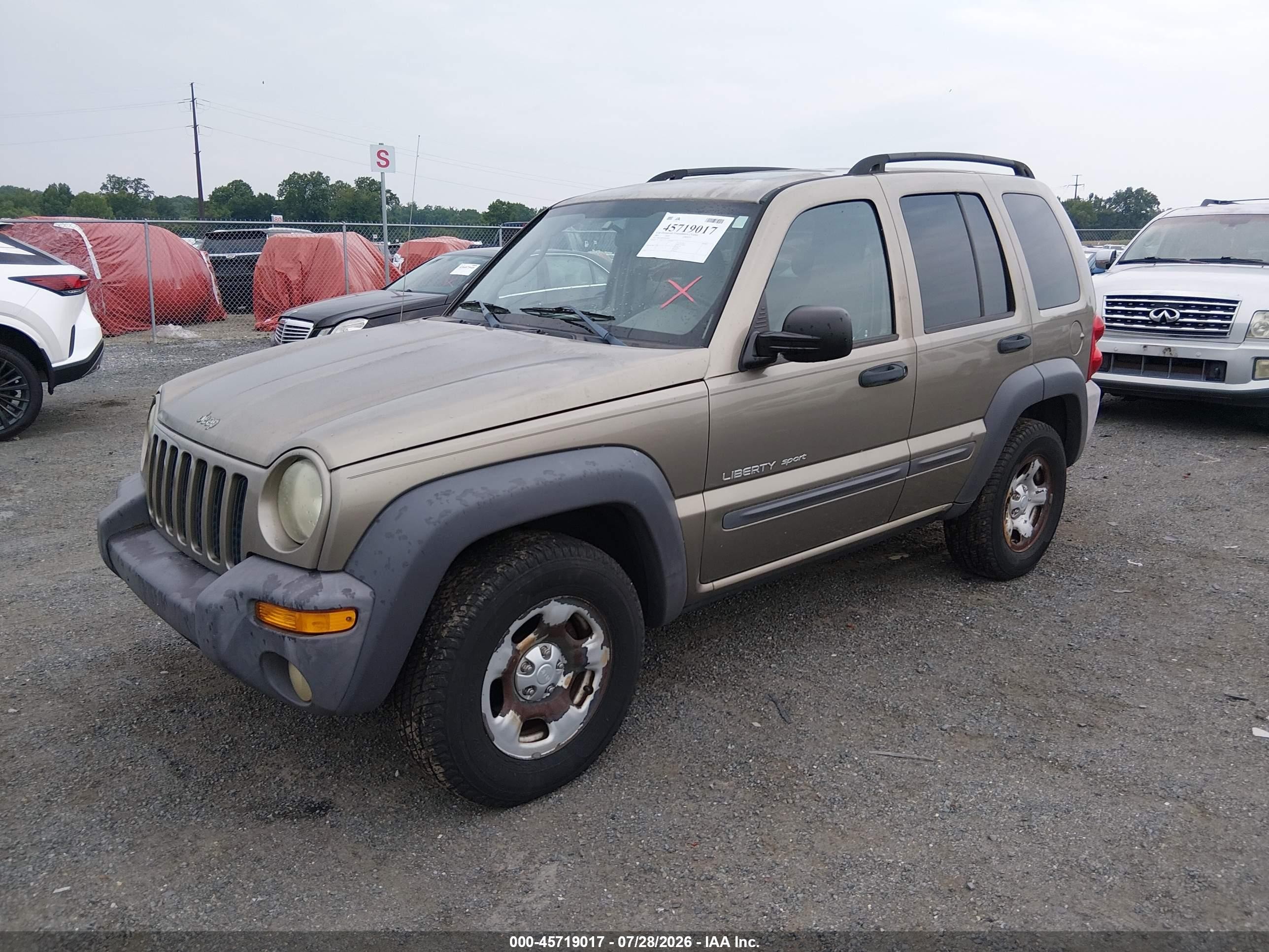 2003 Jeep Liberty Sport Золотой vin: 1J4GL48K83W648703