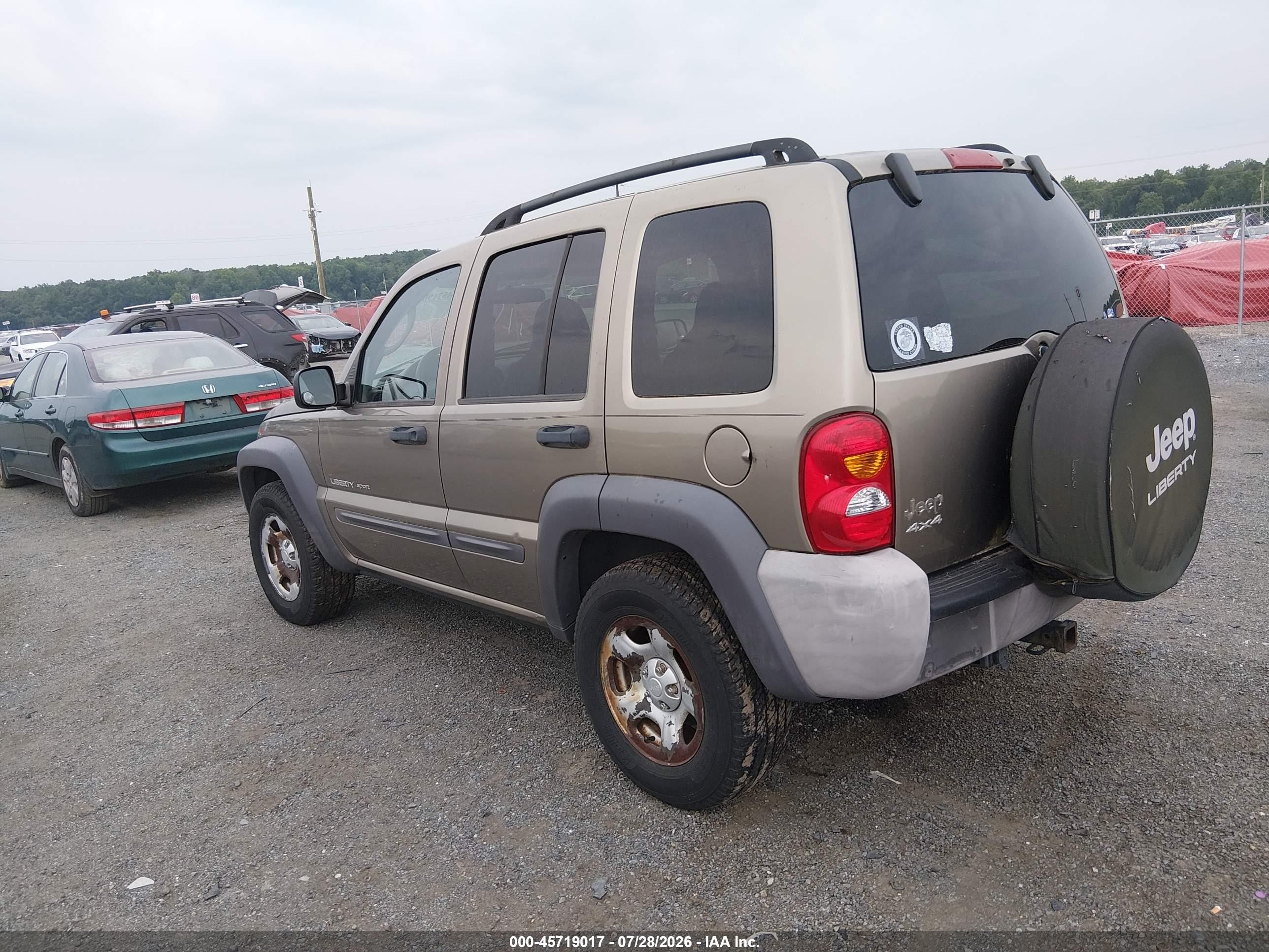 2003 Jeep Liberty Sport Золотой vin: 1J4GL48K83W648703