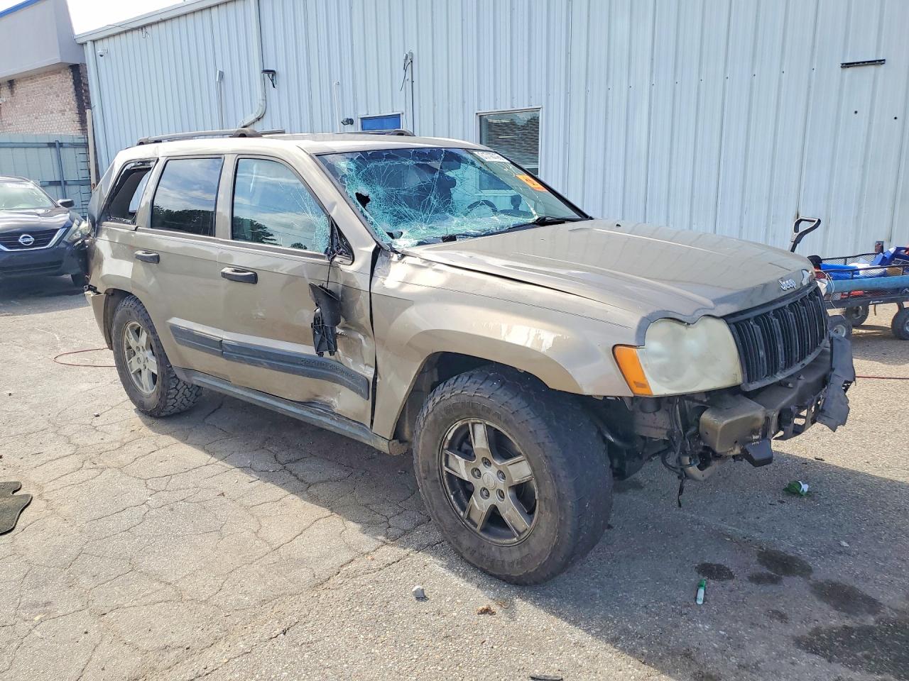 2005 Jeep Grand Cherokee Laredo Золотой vin: 1J4GR48K95C598929