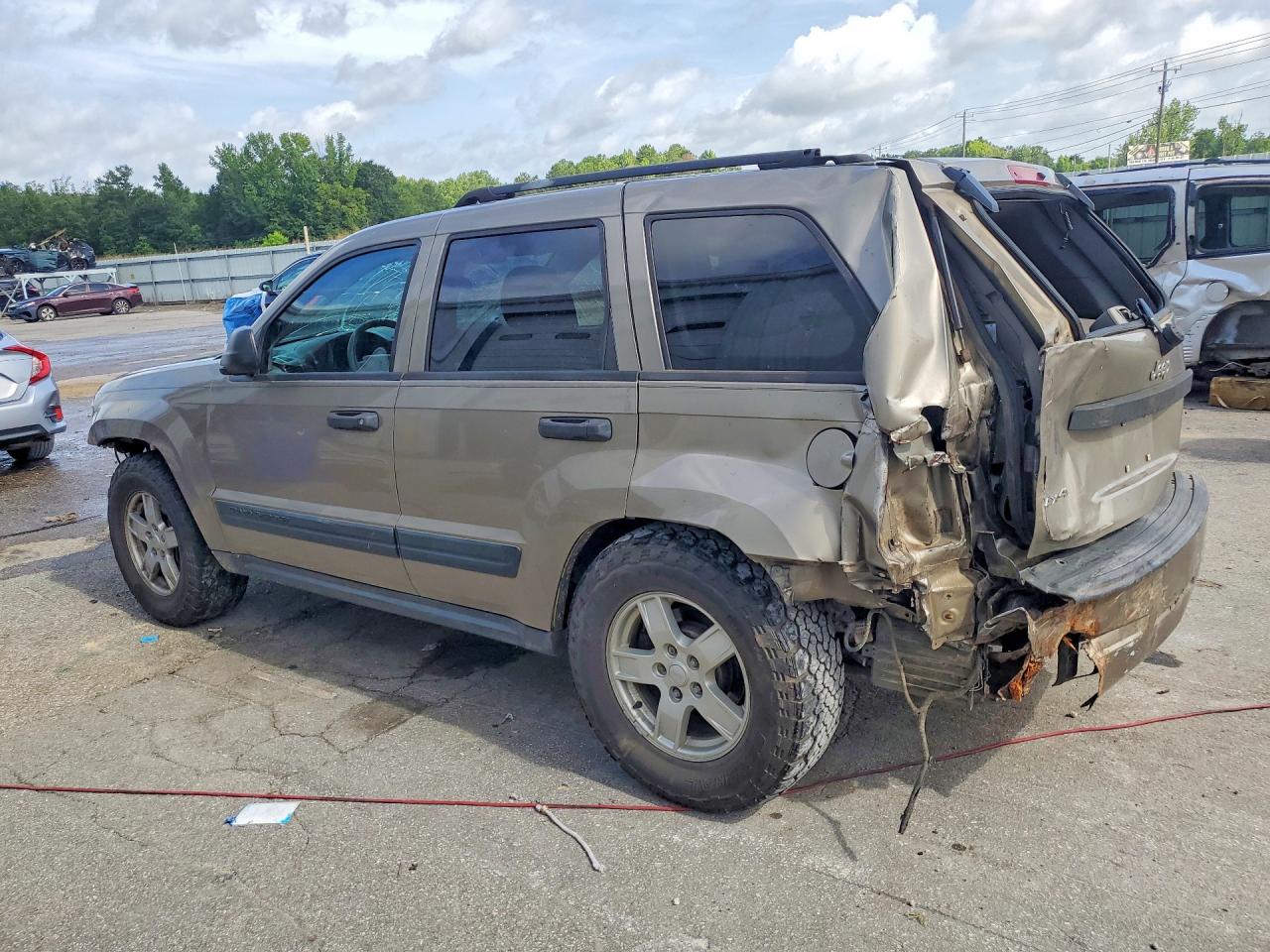 2005 Jeep Grand Cherokee Laredo Золотой vin: 1J4GR48K95C598929