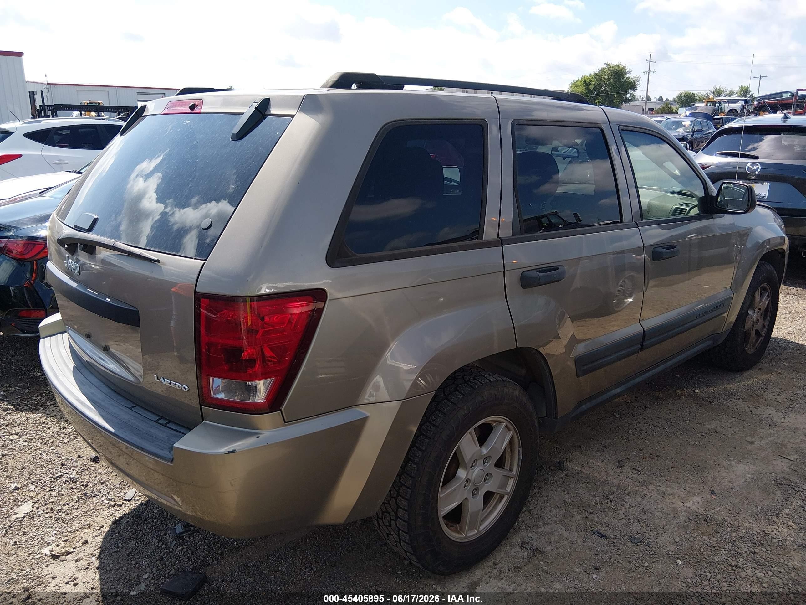 2005 Jeep Grand Cherokee Laredo Желто-коричневый vin: 1J4GS48K05C668872