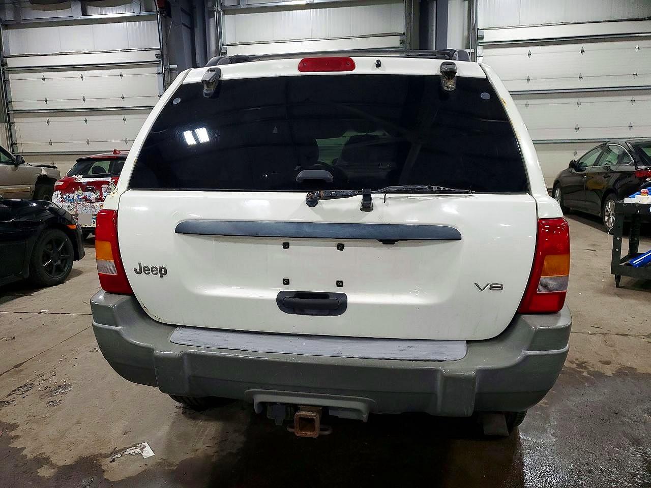 2000 Jeep Grand Cherokee Laredo Белый vin: 1J4GW48N4YC240046