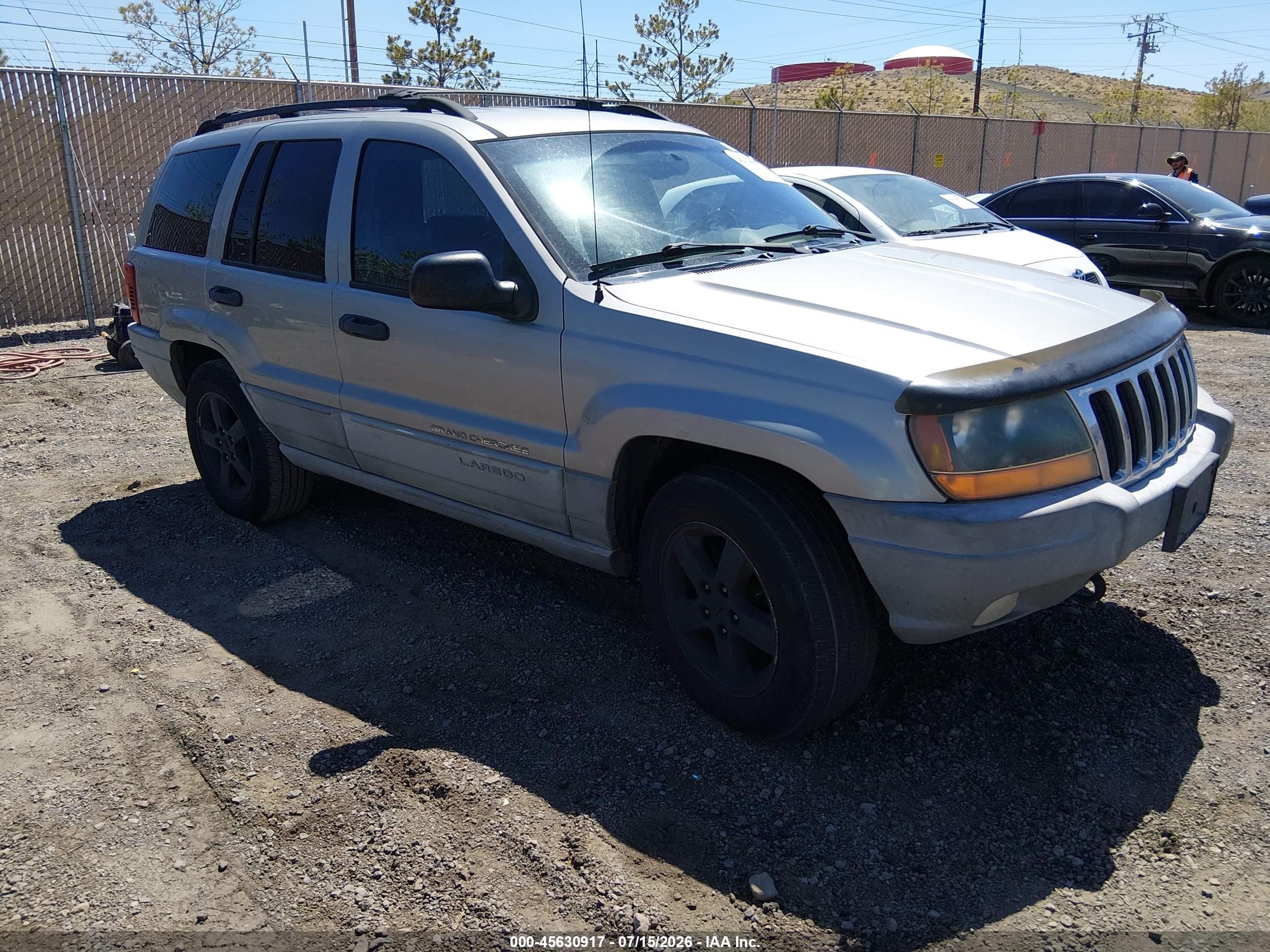 2000 Jeep Grand Cherokee Laredo Коричневый vin: 1J4GW48N7YC285515