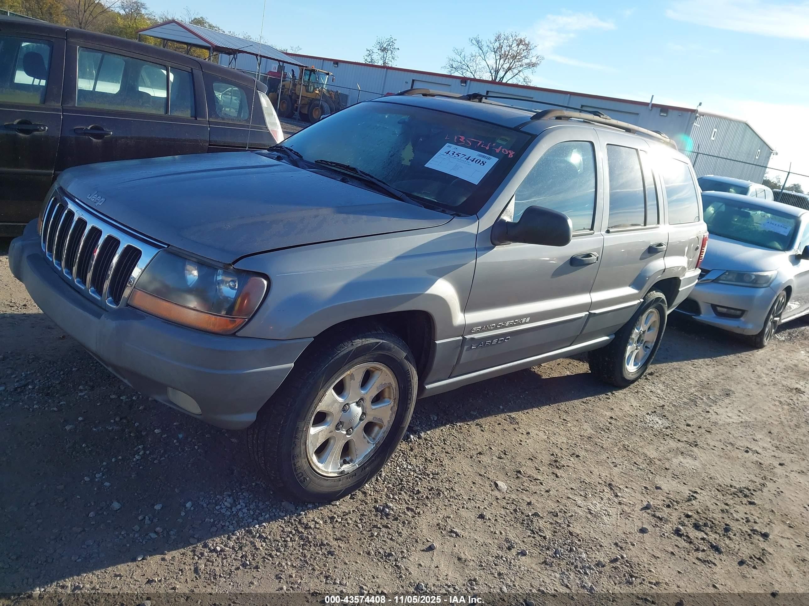 2001 Jeep Grand Cherokee Laredo Серебряный vin: 1J4GW48S81C721428