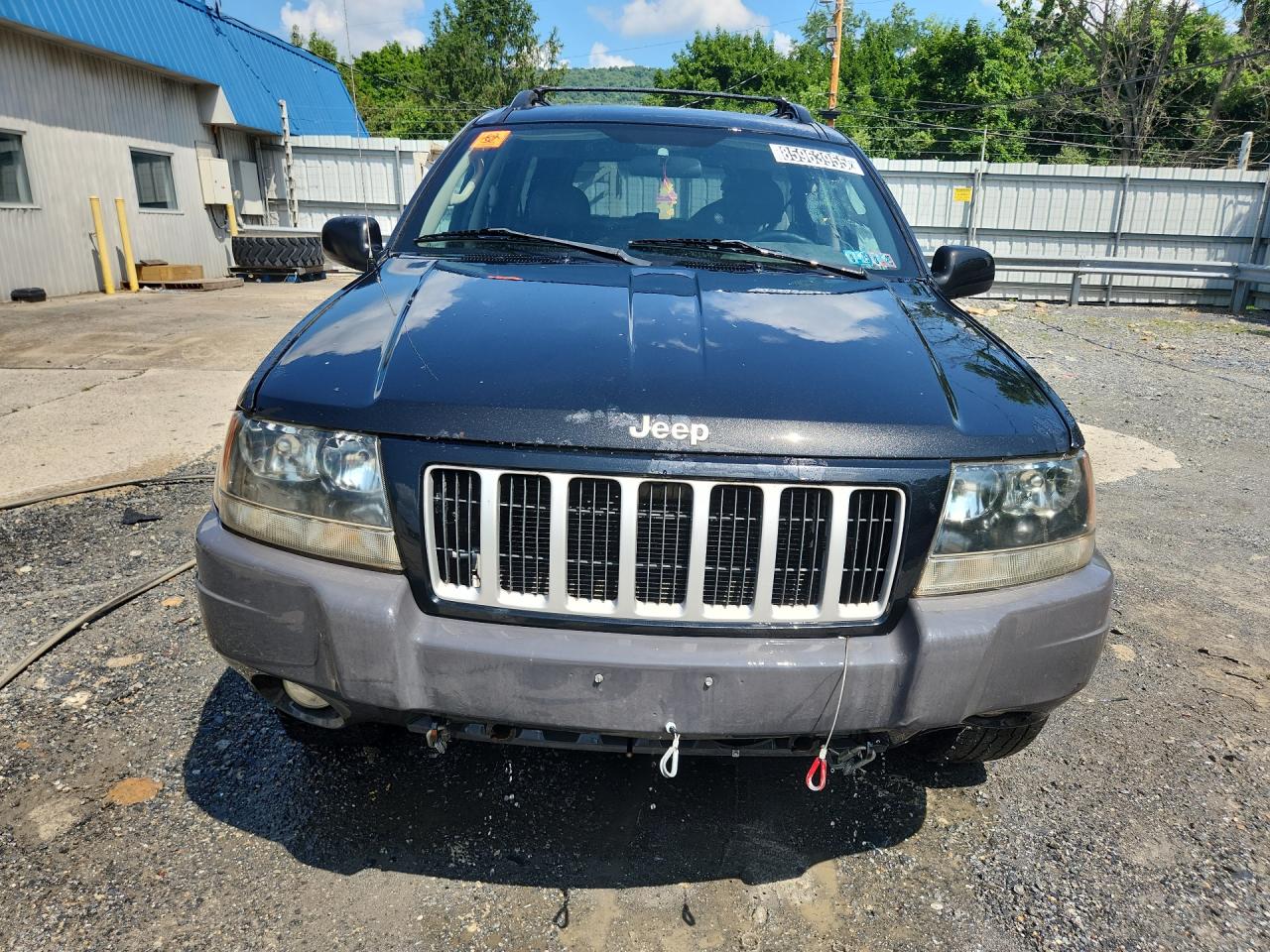 2004 Jeep Grand Cherokee Laredo Black vin: 1J4GW48S84C312866 Damage: Left Head Lamp, Faded, Repair Required