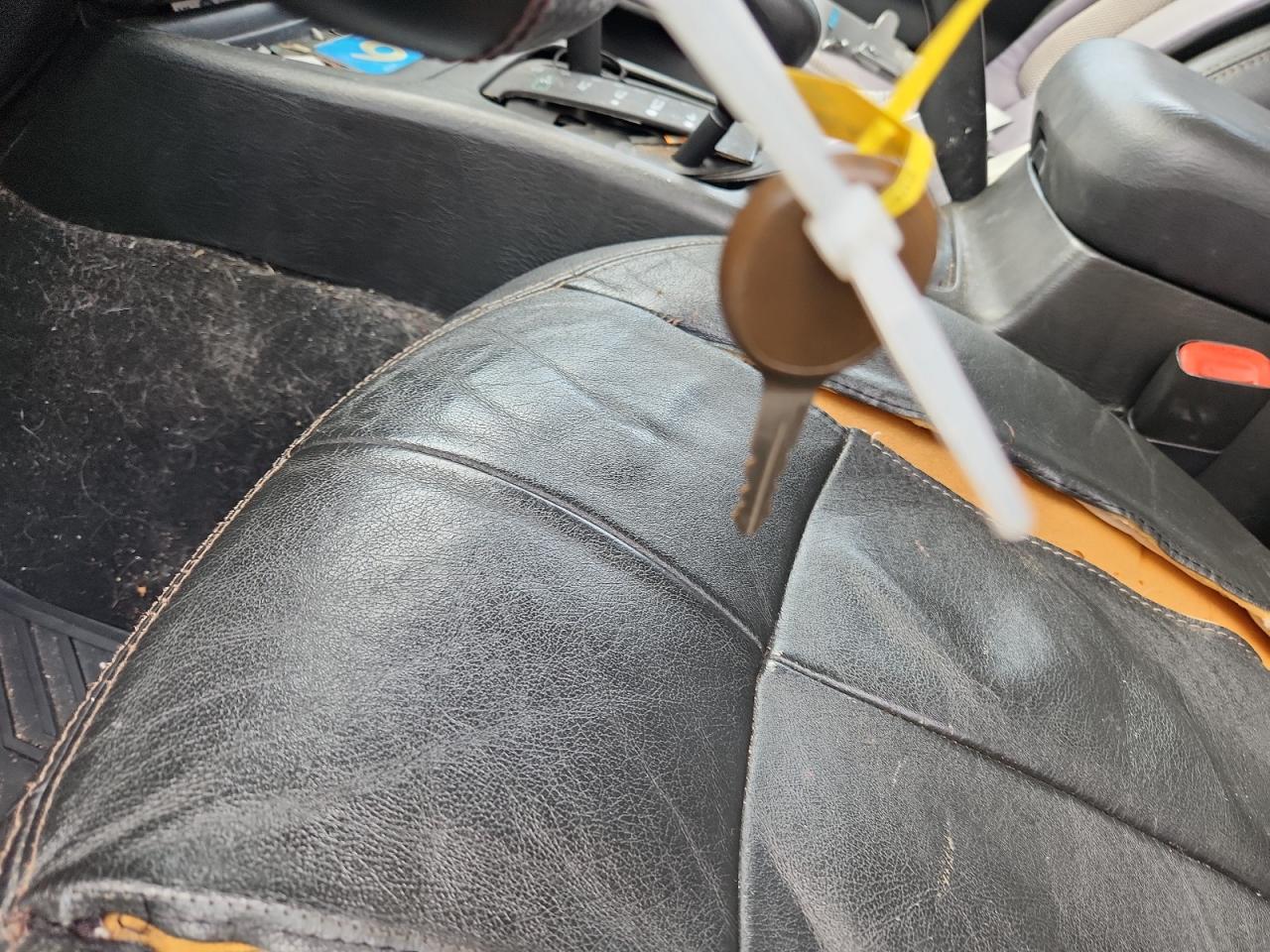 2004 Jeep Grand Cherokee Laredo Black vin: 1J4GW48S84C312866 Damage: Left Front Seat, Torn, > 12 Inches