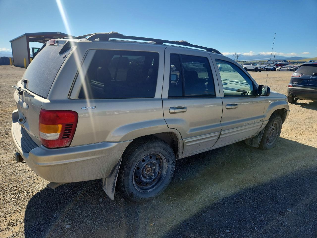 2001 Jeep Grand Cherokee Limited Gold vin: 1J4GW58N01C627348