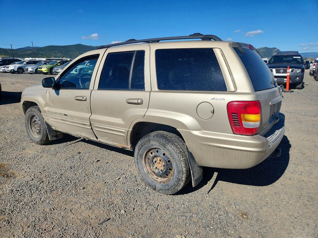 2001 Jeep Grand Cherokee Limited Gold vin: 1J4GW58N01C627348