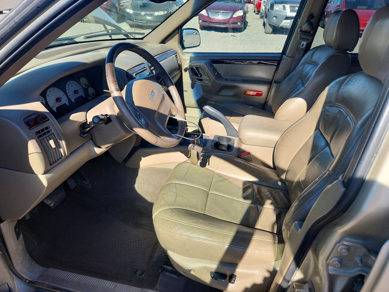 2001 Jeep Grand Cherokee Limited Gold vin: 1J4GW58N01C627348