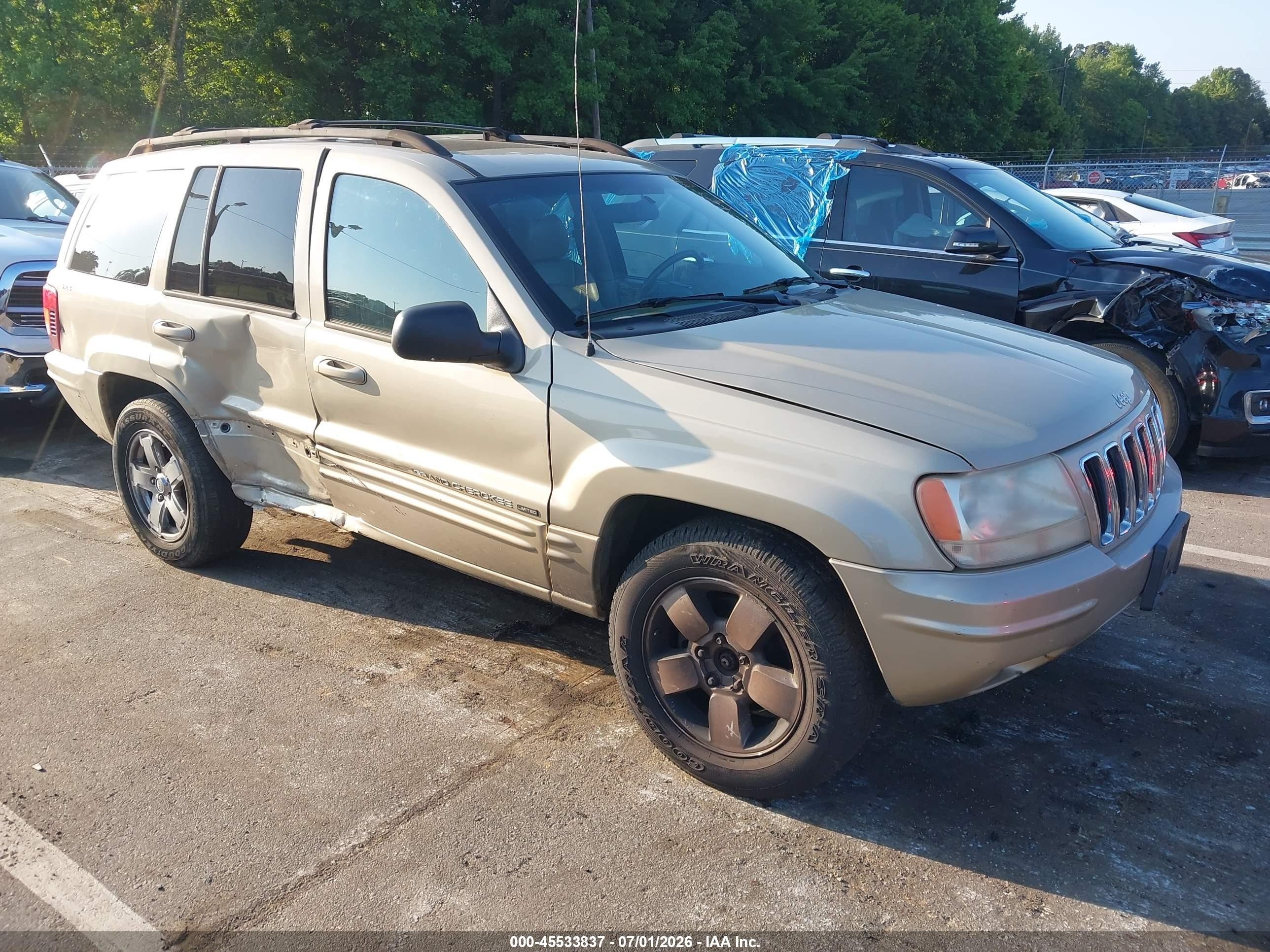 2001 Jeep Grand Cherokee Limited Gold vin: 1J4GW58N41C729932