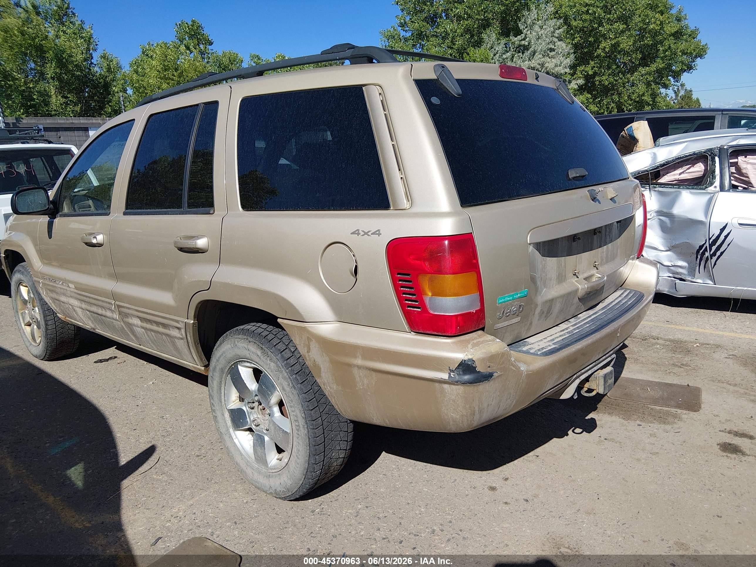 2001 Jeep Grand Cherokee Limited Gold vin: 1J4GW58N71C564653
