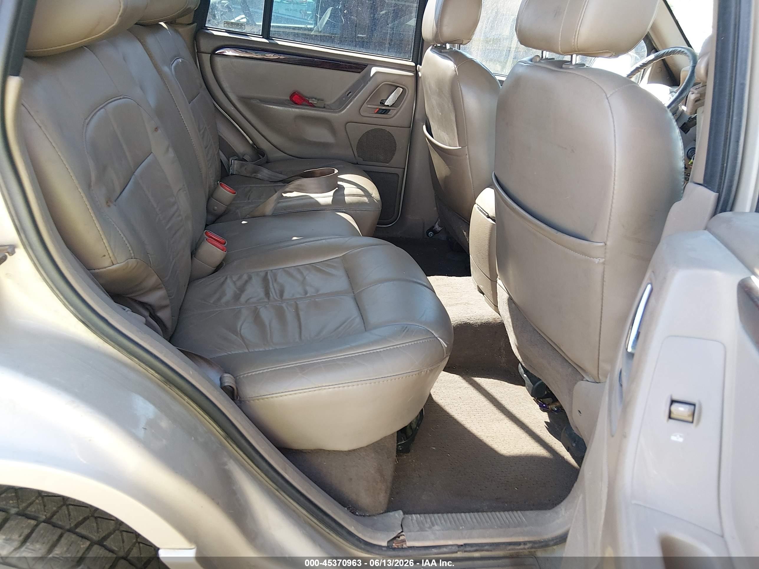 2001 Jeep Grand Cherokee Limited Gold vin: 1J4GW58N71C564653