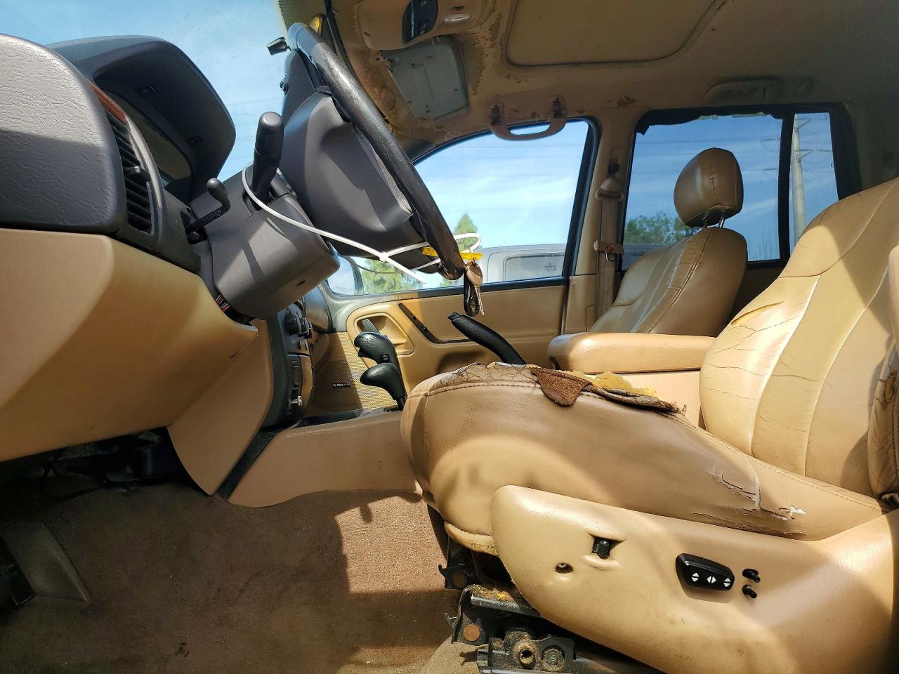1999 Jeep Grand Cherokee Laredo Белый vin: 1J4GW58S3XC589239