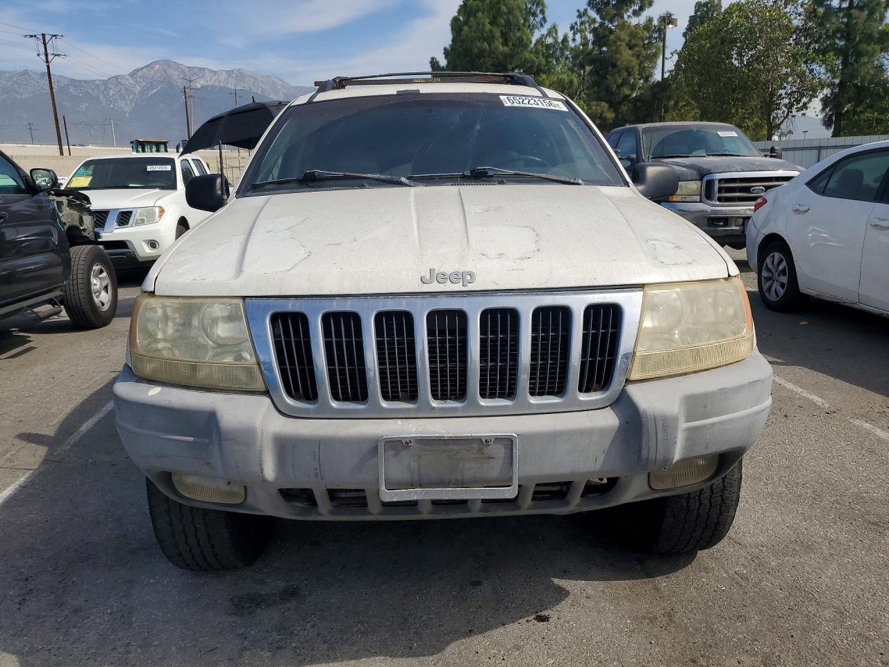 1999 Jeep Grand Cherokee Laredo Белый vin: 1J4GW58S3XC589239