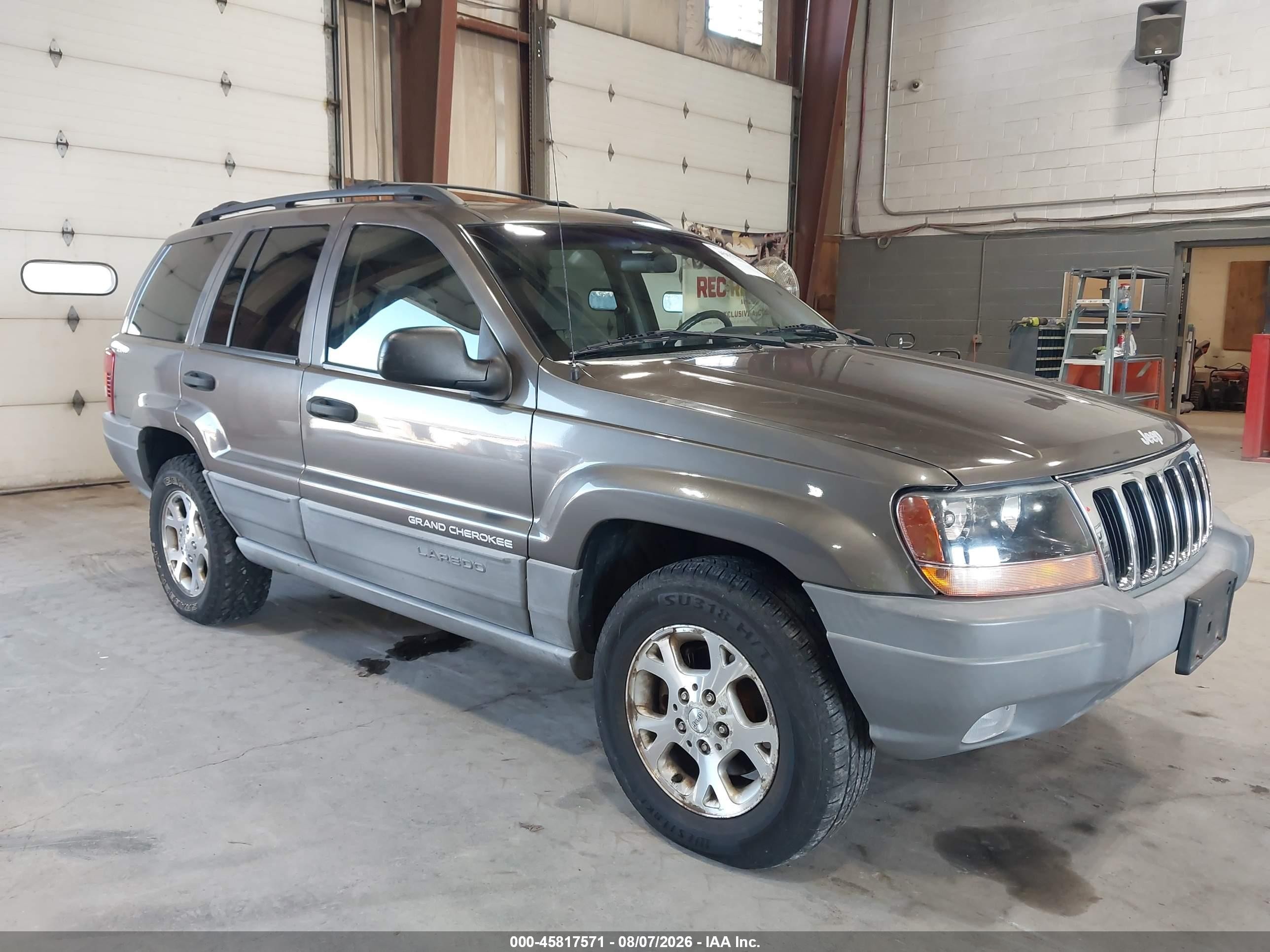 1999 Jeep Grand Cherokee Laredo Gray vin: 1J4GW58S7XC538892