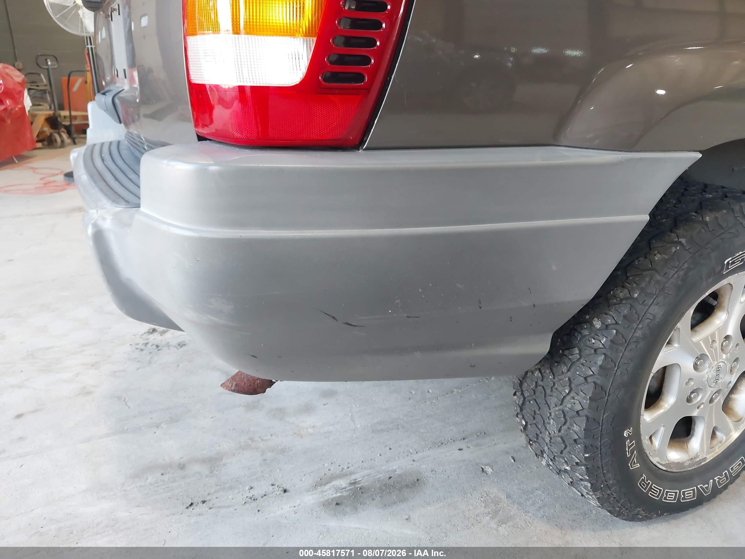 1999 Jeep Grand Cherokee Laredo Gray vin: 1J4GW58S7XC538892