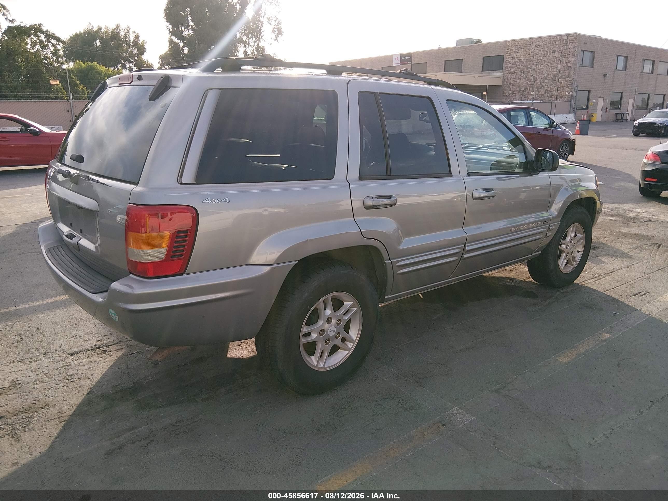 2000 Jeep Grand Cherokee Limited Silver vin: 1J4GW58S7YC124724