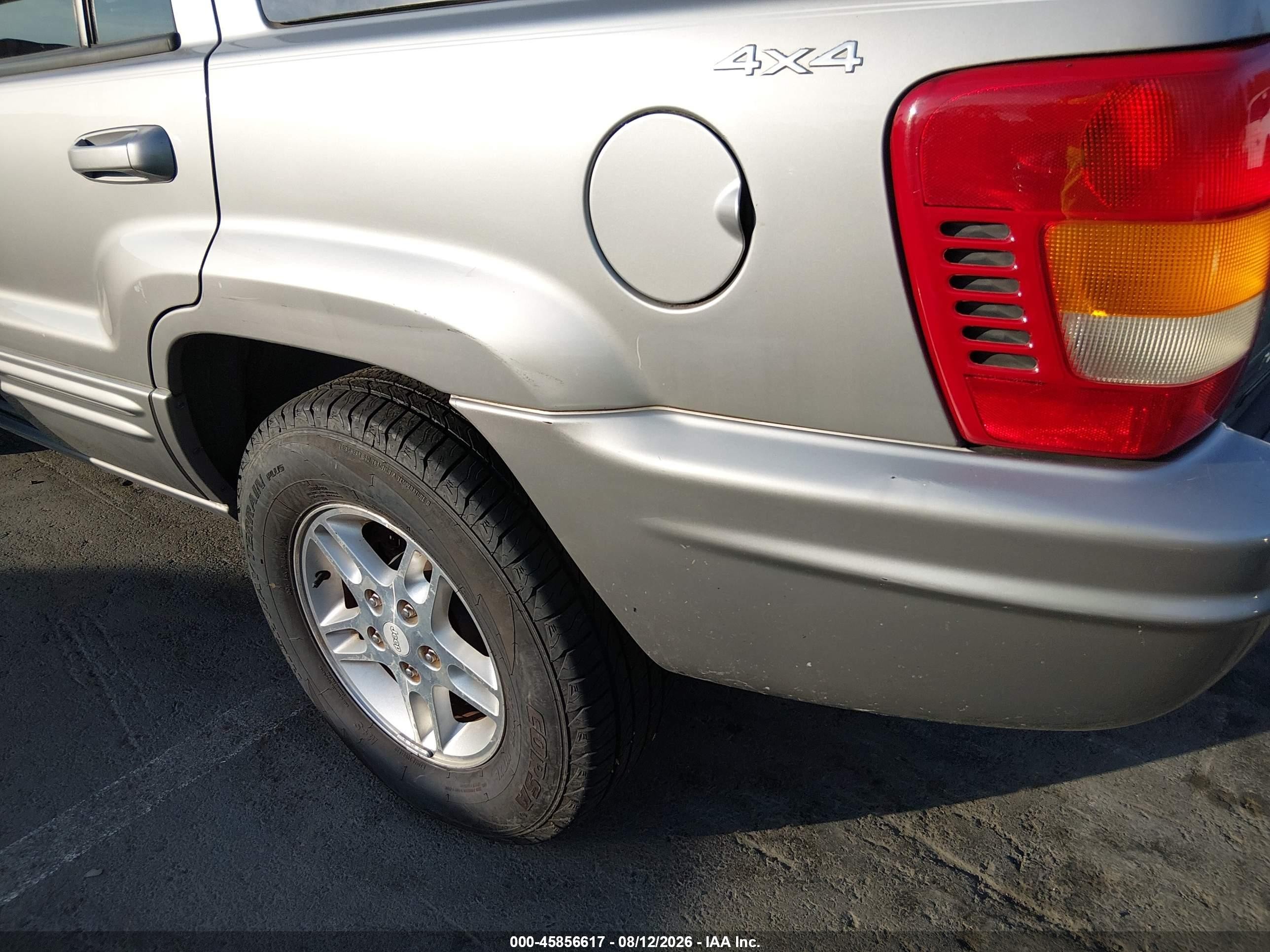 2000 Jeep Grand Cherokee Limited Silver vin: 1J4GW58S7YC124724