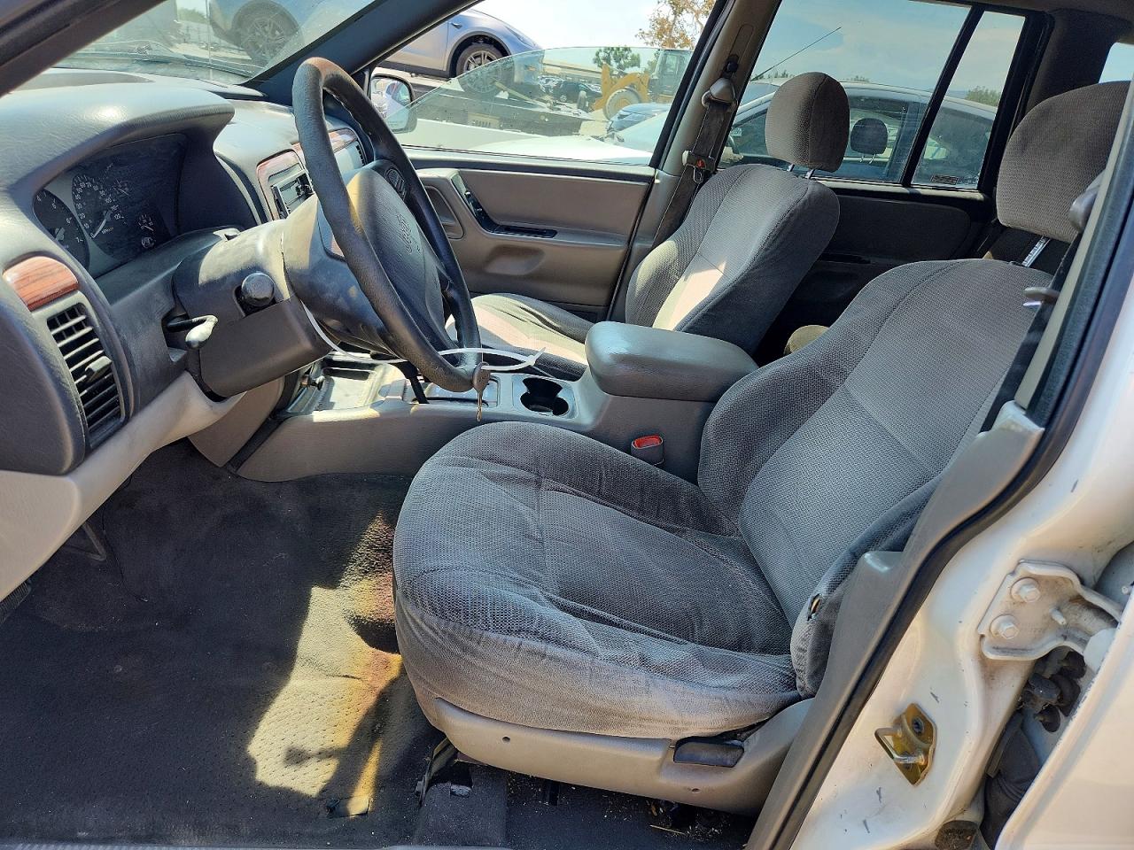1999 Jeep Grand Cherokee Laredo Белый vin: 1J4GW58S9XC682248