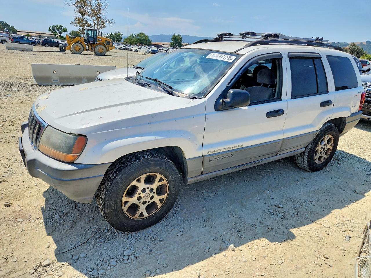 1999 Jeep Grand Cherokee Laredo Белый vin: 1J4GW58S9XC682248