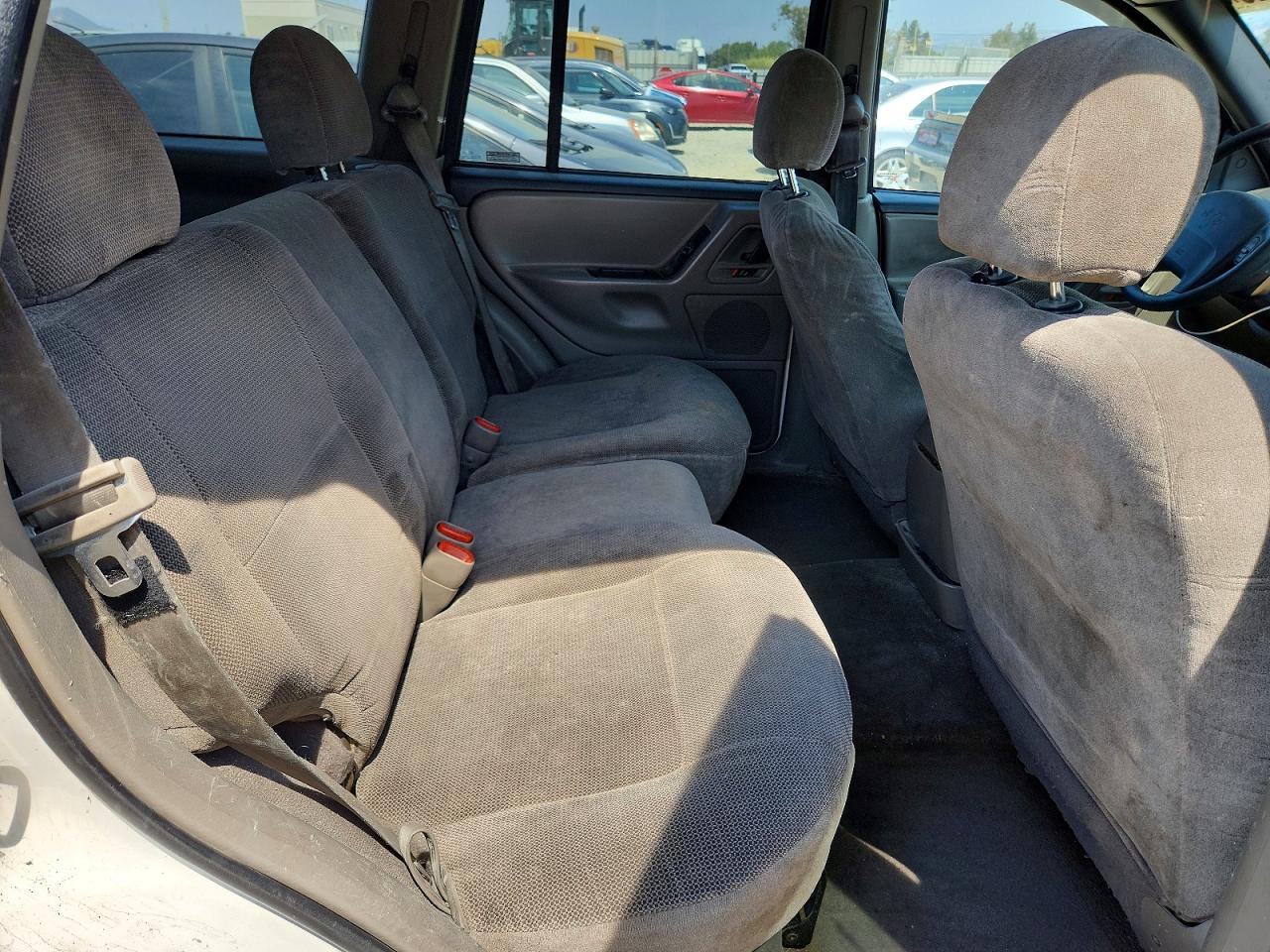 1999 Jeep Grand Cherokee Laredo Белый vin: 1J4GW58S9XC682248