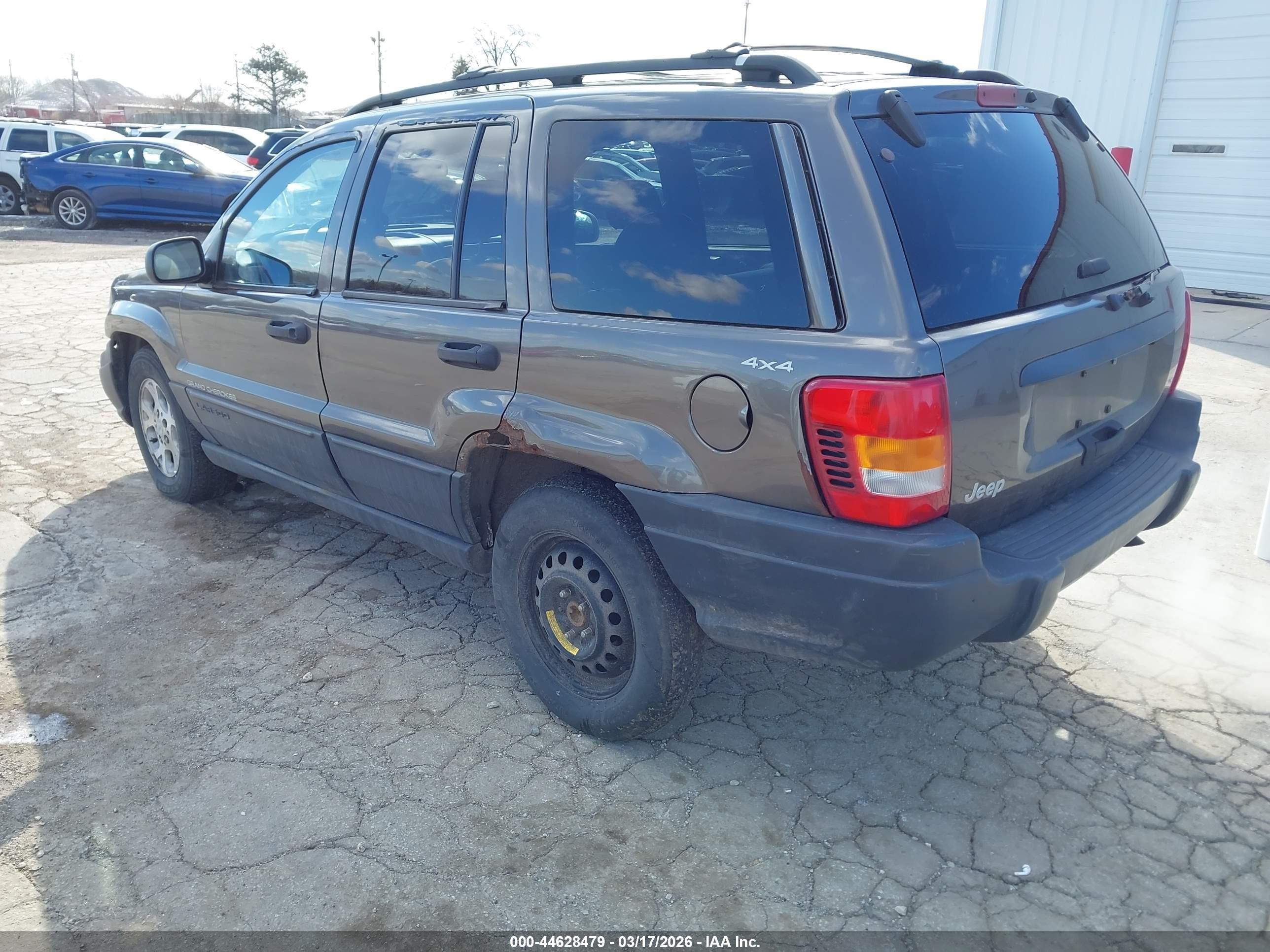 1999 Jeep Grand Cherokee Laredo Серый vin: 1J4GW58SXXC609972