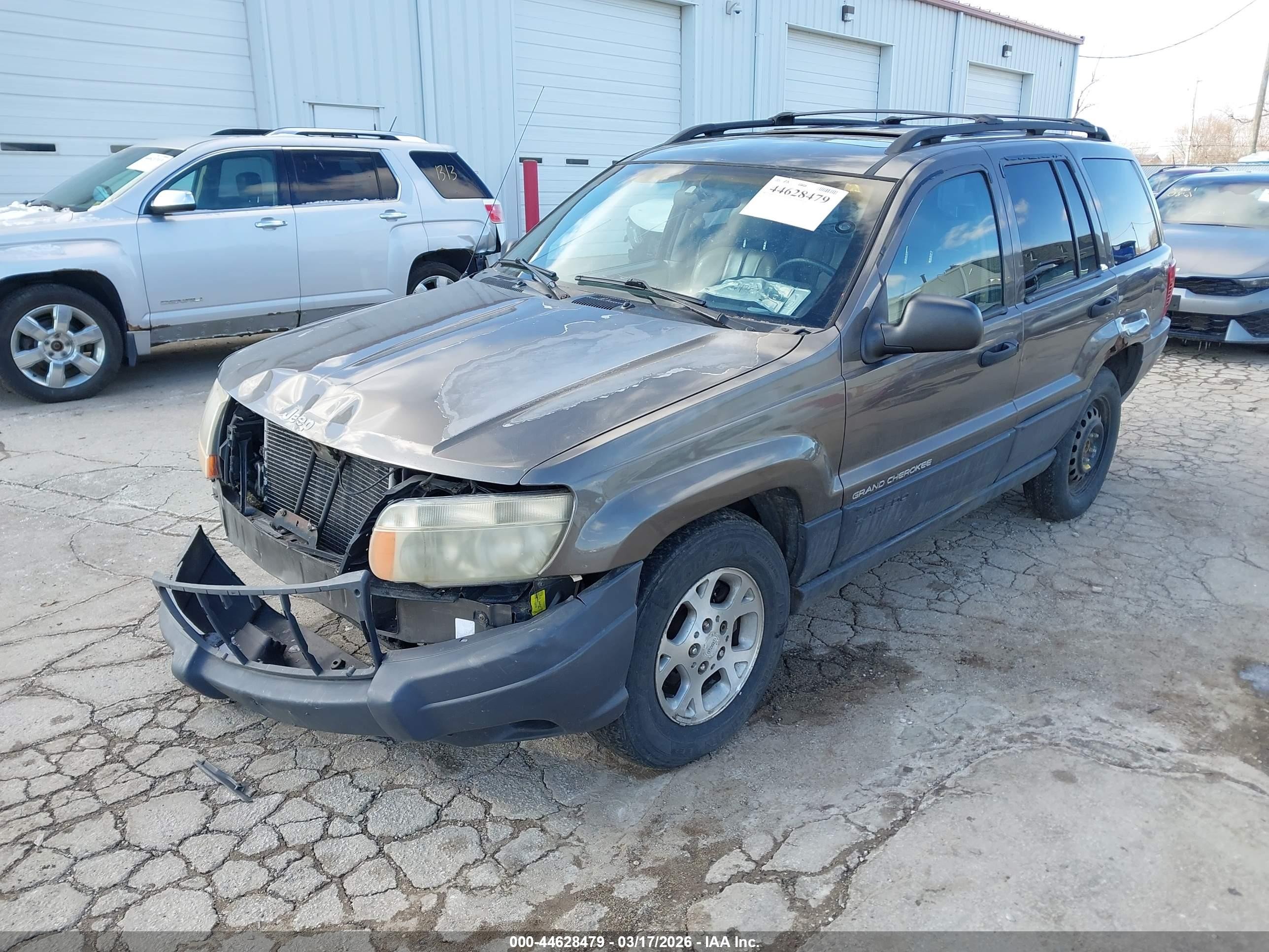 1999 Jeep Grand Cherokee Laredo Серый vin: 1J4GW58SXXC609972