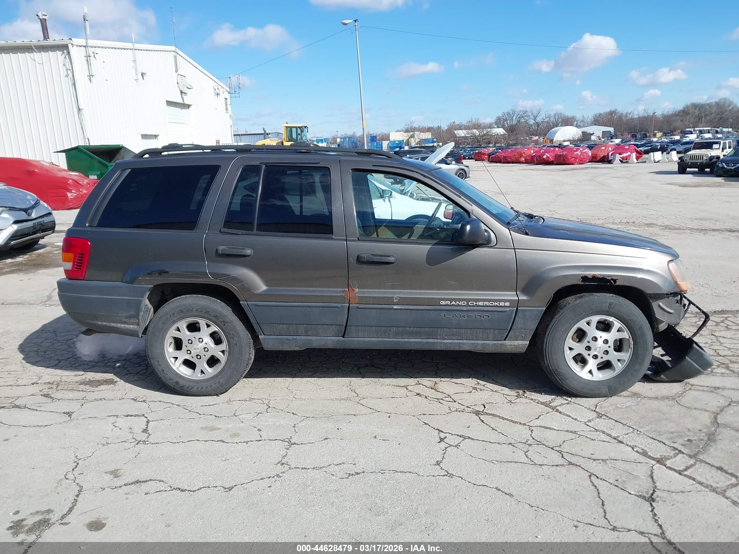 1999 Jeep Grand Cherokee Laredo Серый vin: 1J4GW58SXXC609972