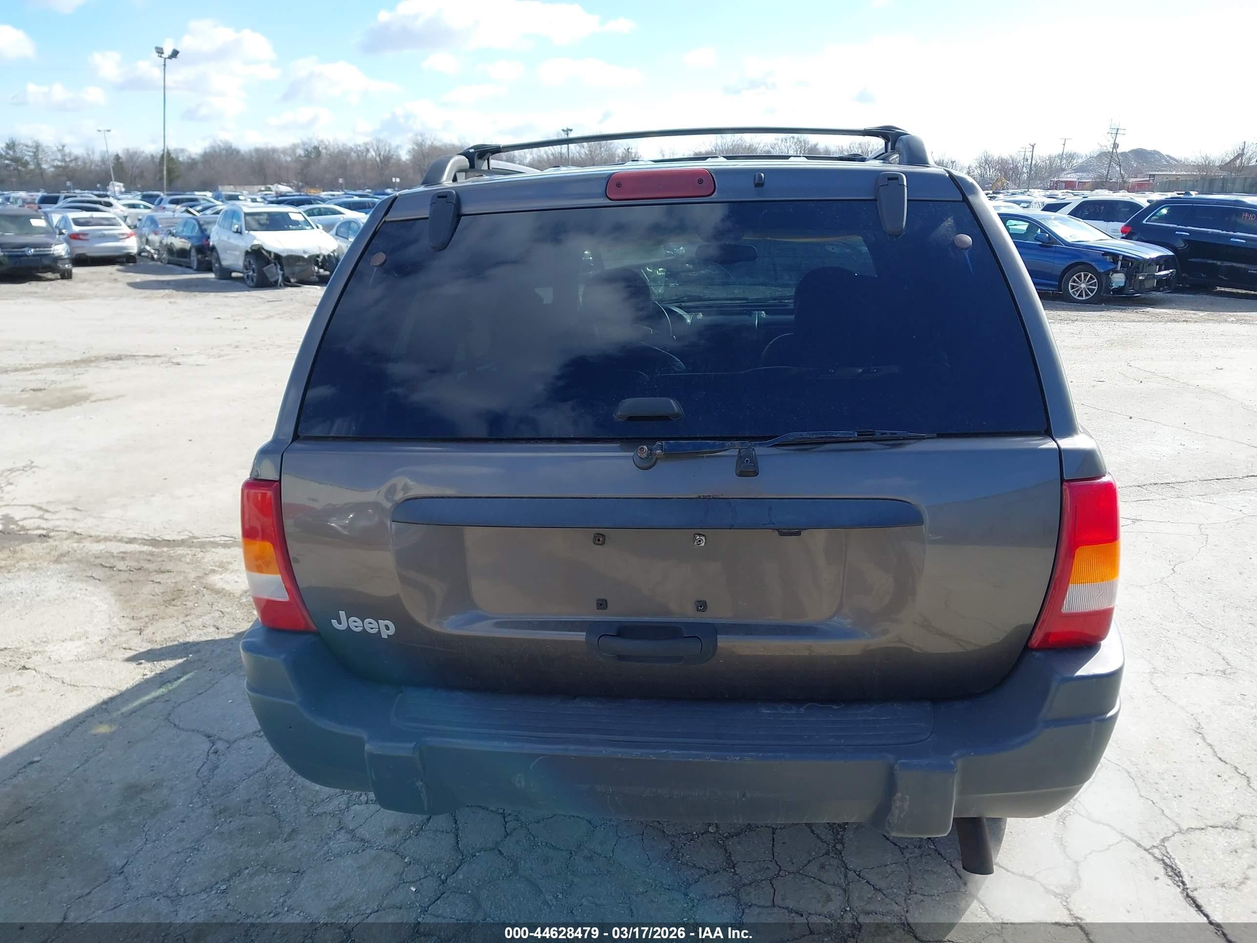 1999 Jeep Grand Cherokee Laredo Серый vin: 1J4GW58SXXC609972