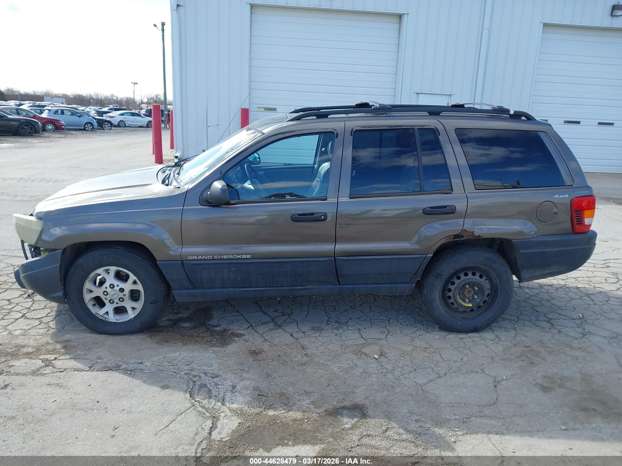 1999 Jeep Grand Cherokee Laredo Серый vin: 1J4GW58SXXC609972