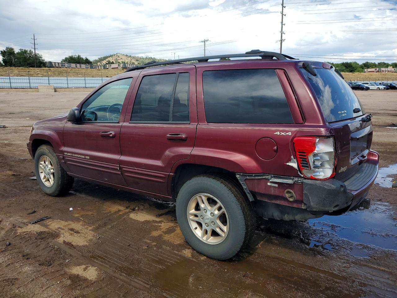 1999 Jeep Grand Cherokee Limited Burgundy vin: 1J4GW68N0XC597654