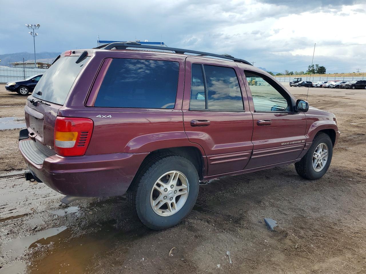 1999 Jeep Grand Cherokee Limited Burgundy vin: 1J4GW68N0XC597654