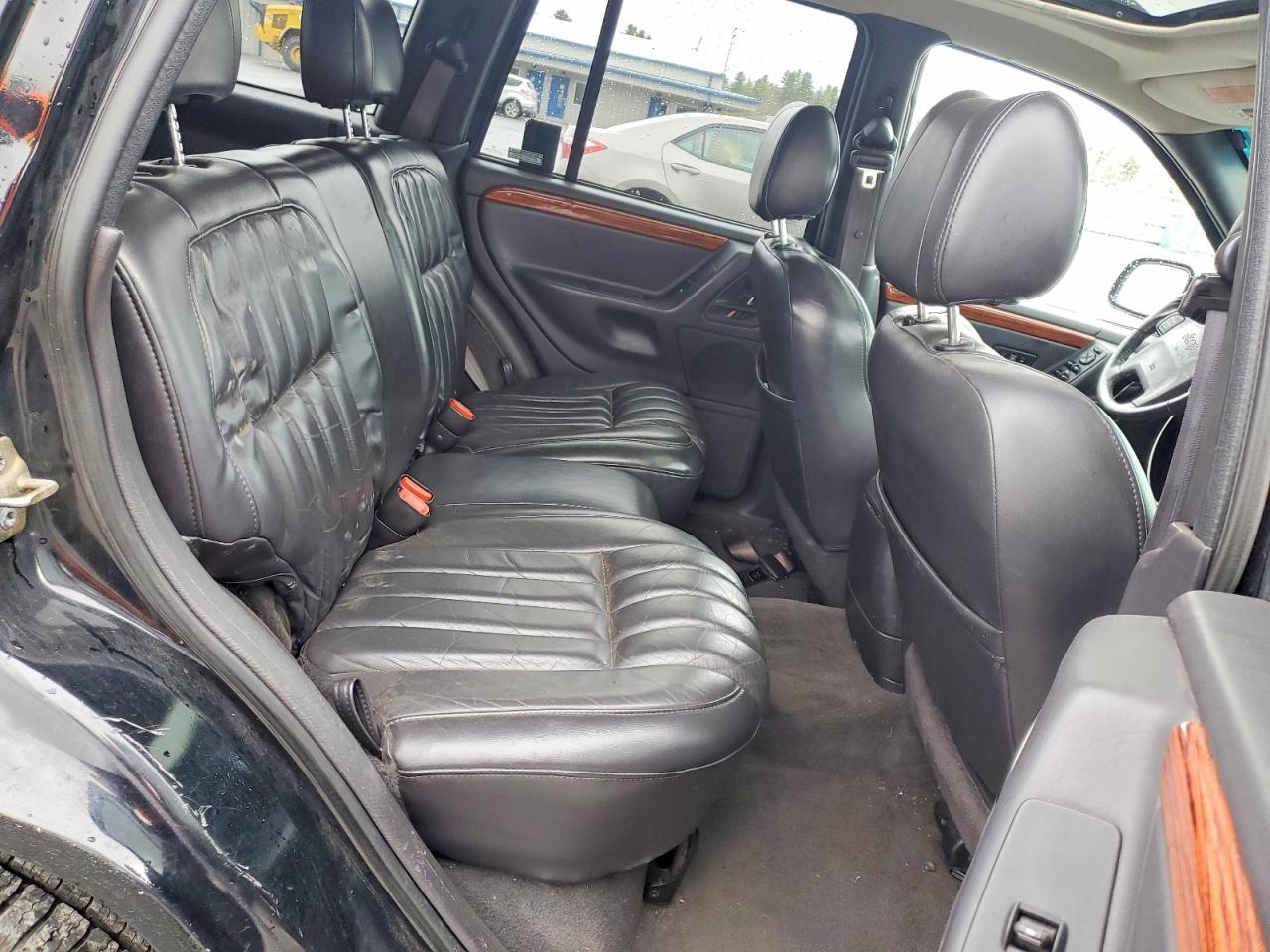 1999 Jeep Grand Cherokee Limited Черный vin: 1J4GW68S3XC615263