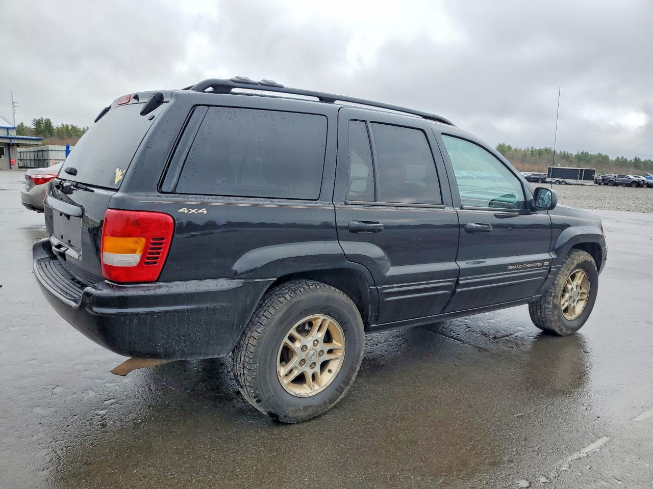 1999 Jeep Grand Cherokee Limited Черный vin: 1J4GW68S3XC615263