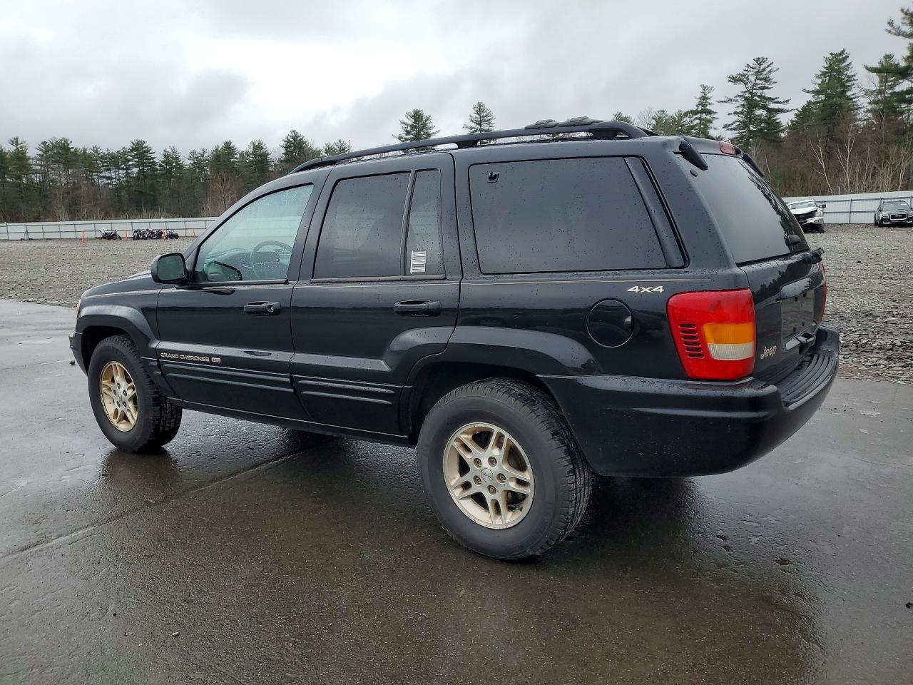 1999 Jeep Grand Cherokee Limited Черный vin: 1J4GW68S3XC615263