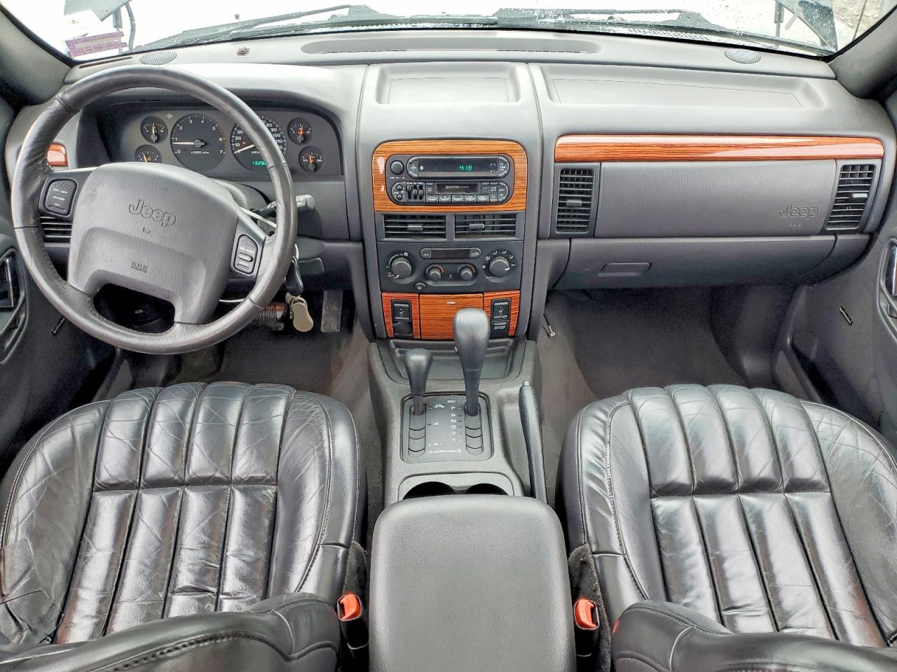 1999 Jeep Grand Cherokee Limited Черный vin: 1J4GW68S3XC615263