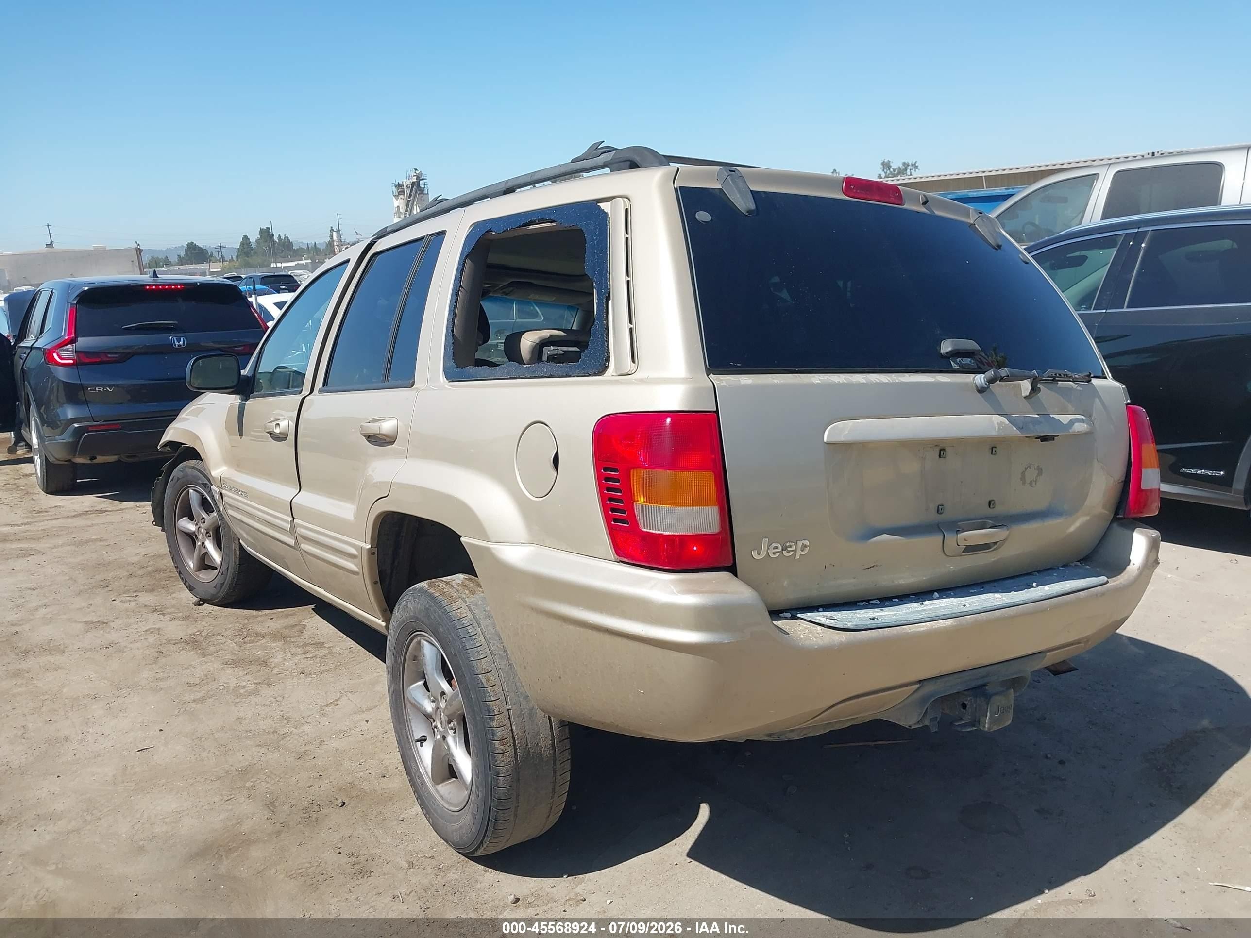 2001 Jeep Grand Cherokee Limited Gold vin: 1J4GX58S21C642324
