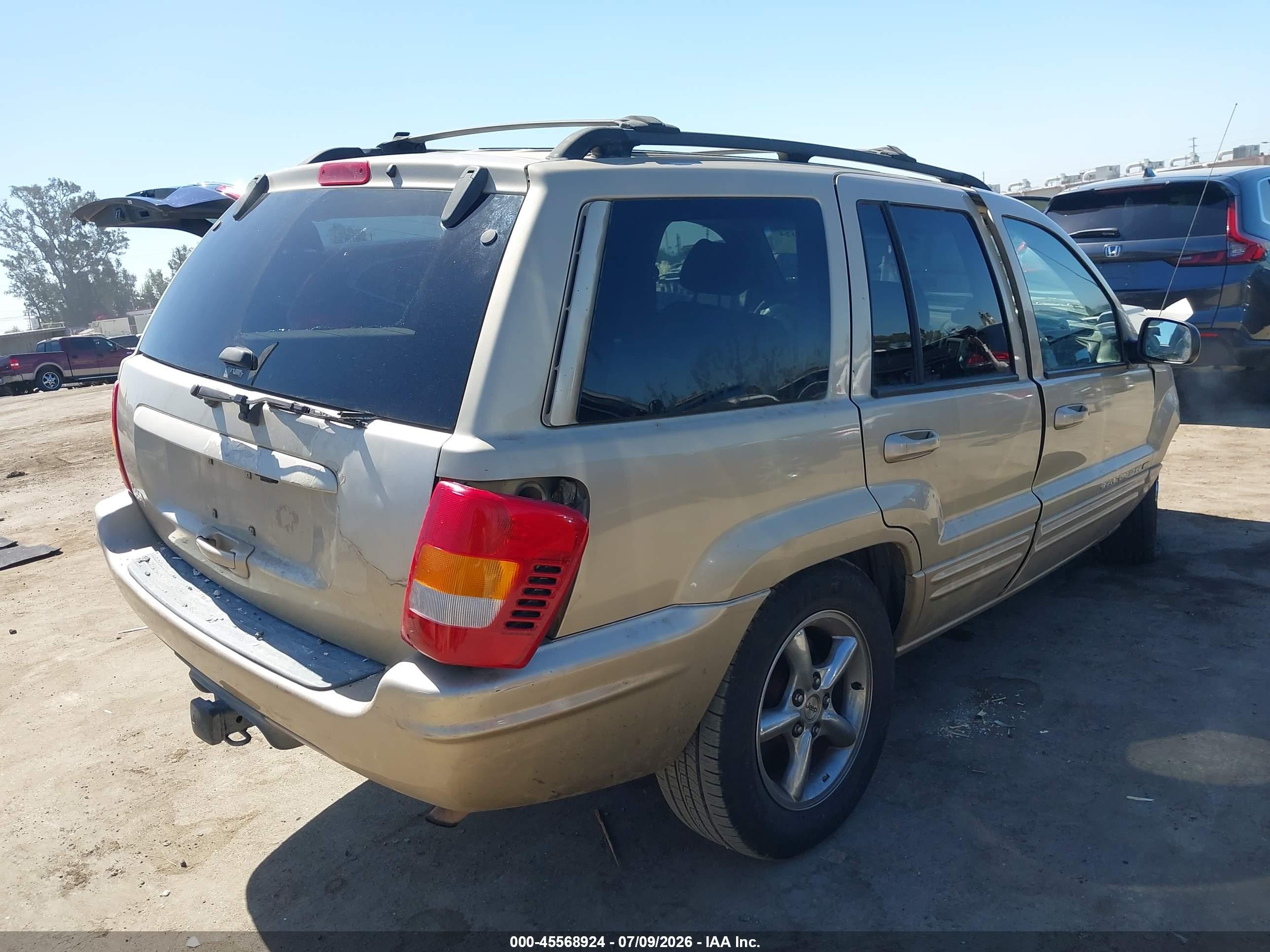 2001 Jeep Grand Cherokee Limited Gold vin: 1J4GX58S21C642324
