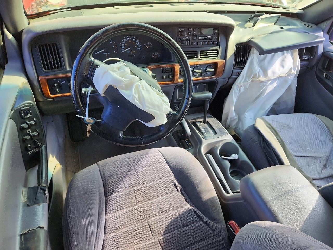 1998 Jeep Grand Cherokee Red vin: 1J4GZ58S0WC209893