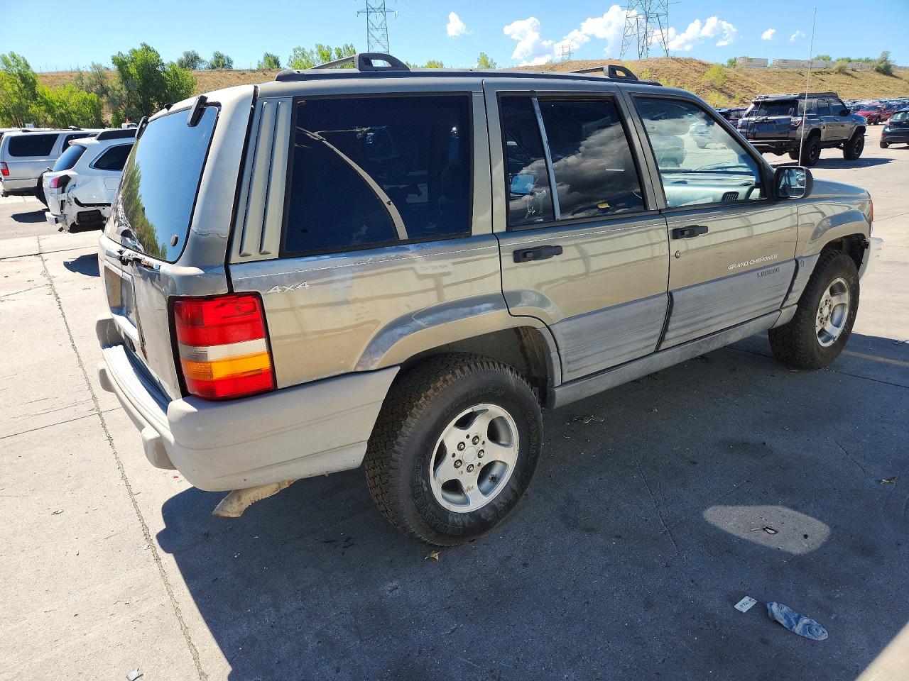 1998 Jeep Grand Cherokee Lared Желто-коричневый vin: 1J4GZ58S1WC367515